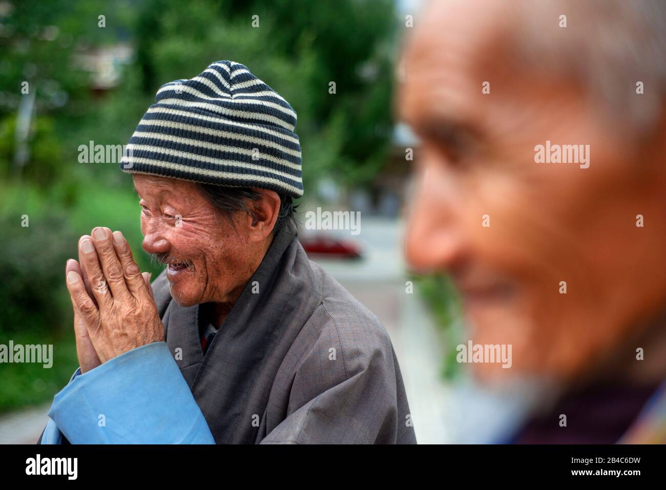 Devotes pray at The National Memorial Chorten stupa in Thimphu Bhutan.  The annual “Moelam Chenmo” that is the Great Prayer Festival and many religiou Stock Photo