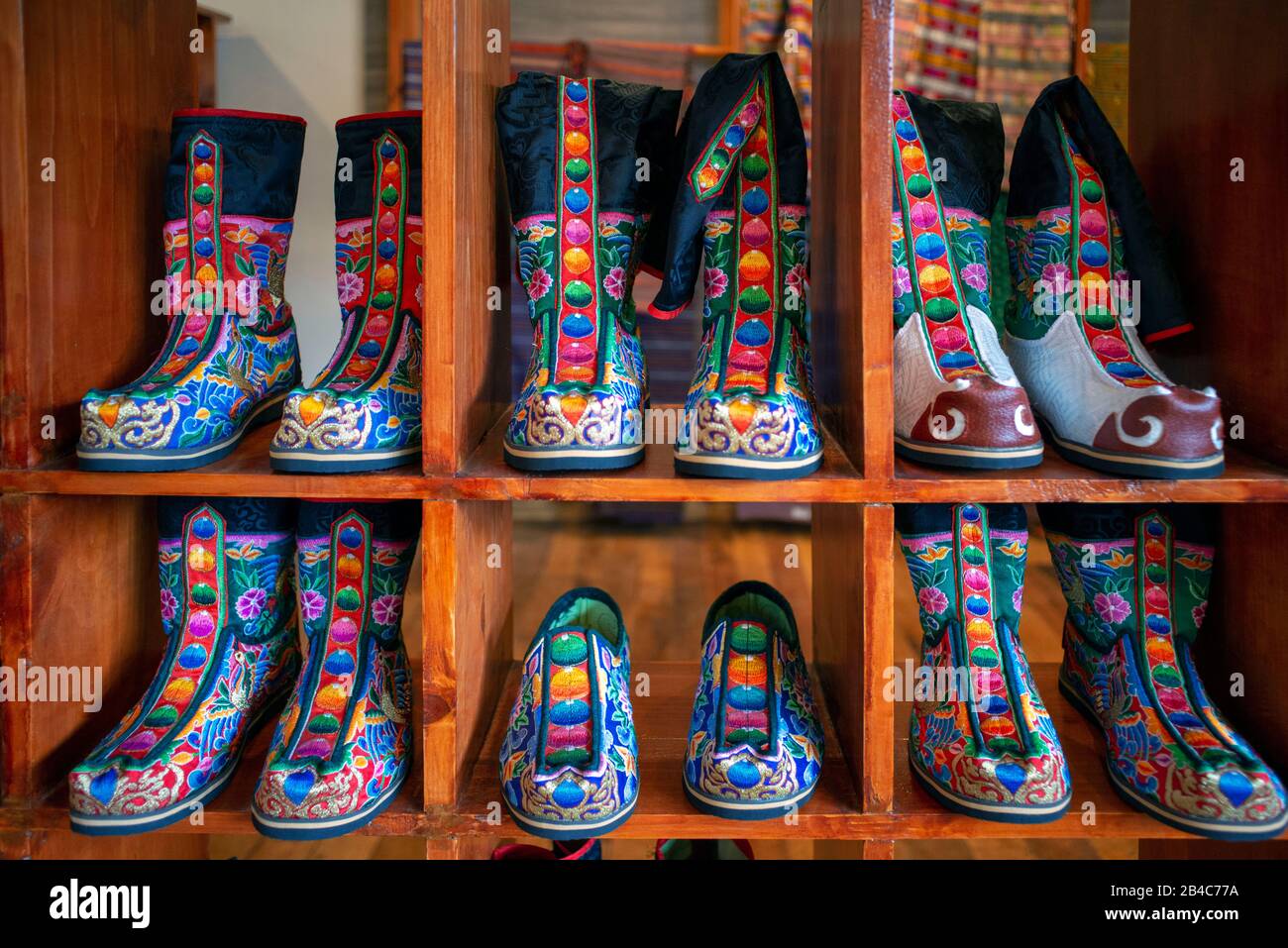 Traditionally decorated embroidered formal boot at tsechu market stall at Thimphu Bhutan Stock Photo