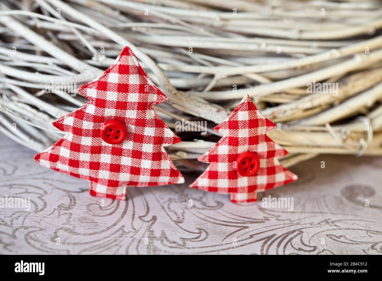 nordic Christmas still life with red white gingham textile Xmas trees