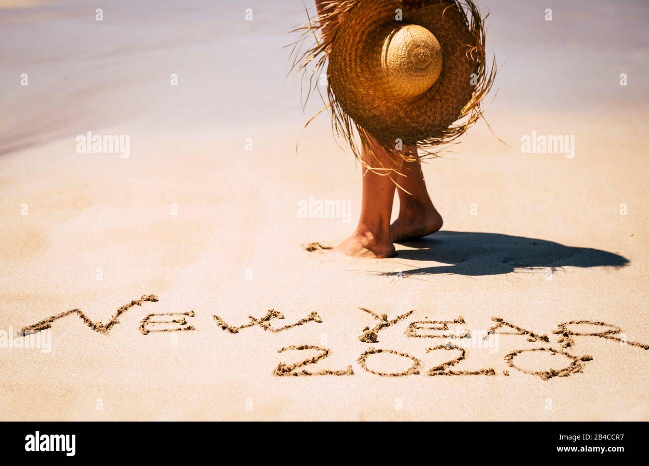 New year eve celebration and start with new life and adventure concept with people in tropical beach under a nice sun enjoying the lifestyle and be happy Stock Photo