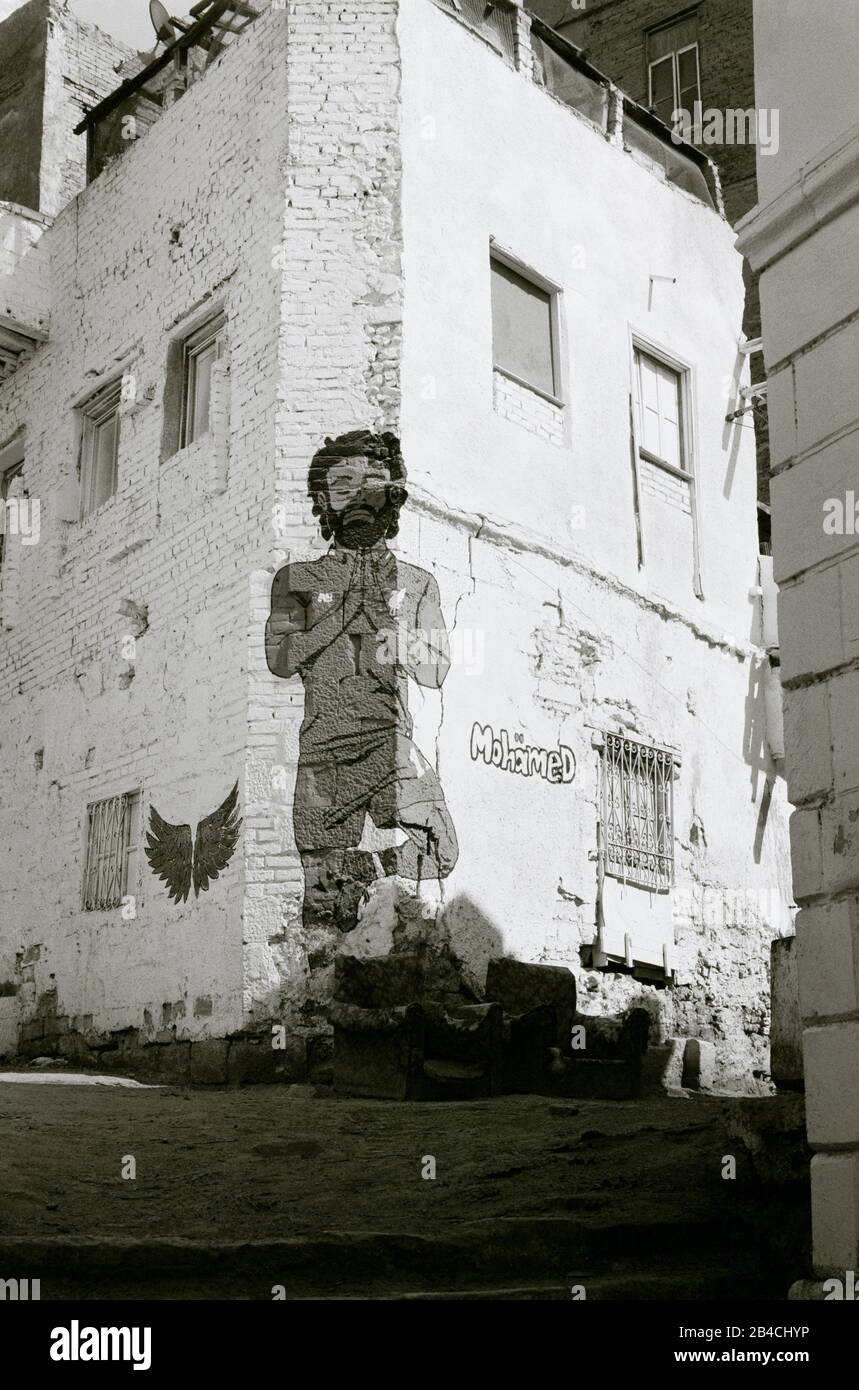 Black And White Photography - Street art of Liverpool and Egypt footballer Mo Salah in Islamic Cairo in Egypt in North Africa Middle East Stock Photo