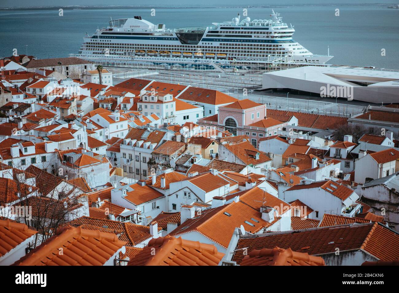 Rooftops panorama of the oldest district Alfama in Lisbon. Cruise boat on the Tagus River. Lisbon, Lisboa, Lissabon, Portugal, Europe Stock Photo