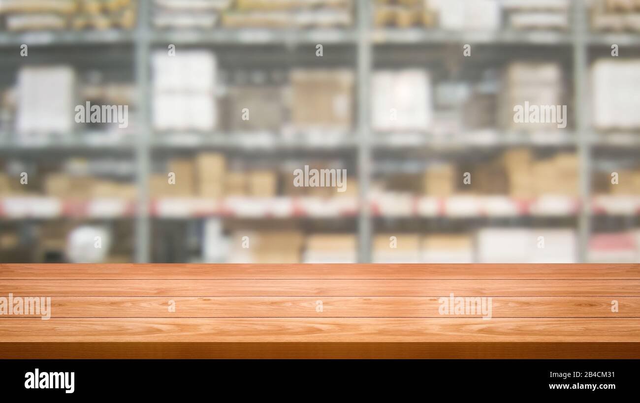 Download Wood Table In Warehouse Storage Blur Background With Empty Copy Space On The Table For Product Display Mockup Hardware Goods Distribution And Industr Stock Photo Alamy