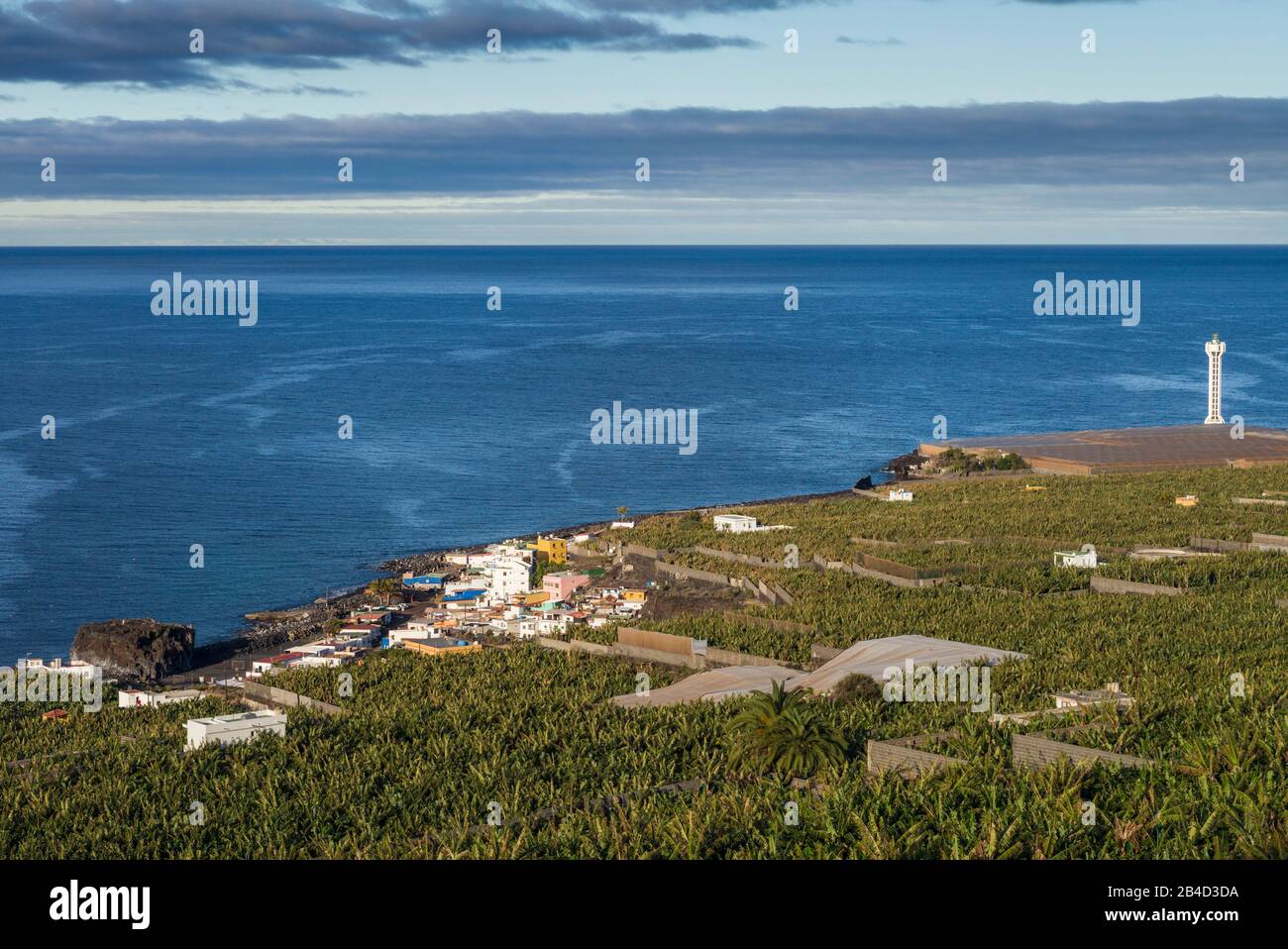 Spain, Canary Islands, La Palma Island, La Bombilla, elevated viallge view with banana plantation Stock Photo