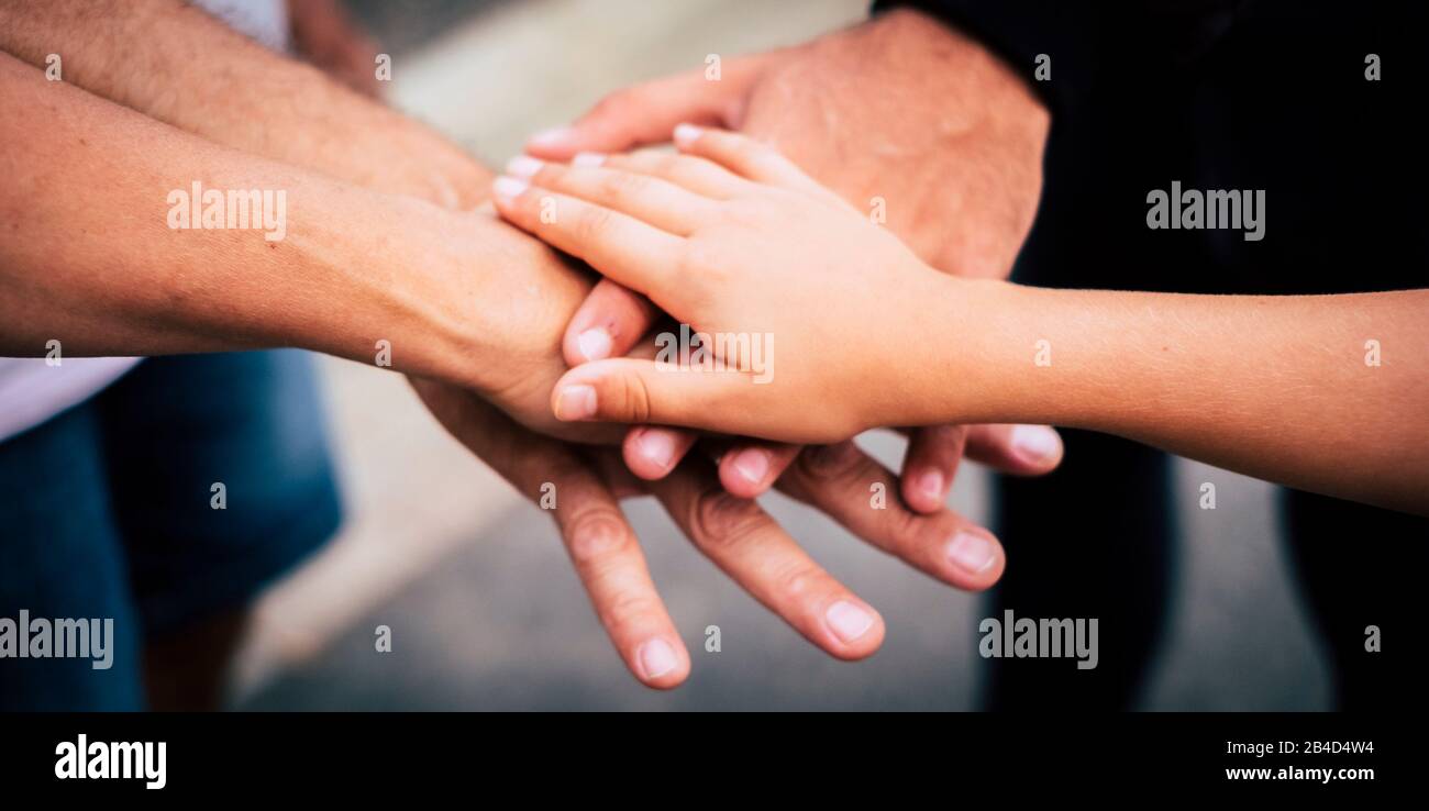 Hands, one above the other, generations Stock Photo