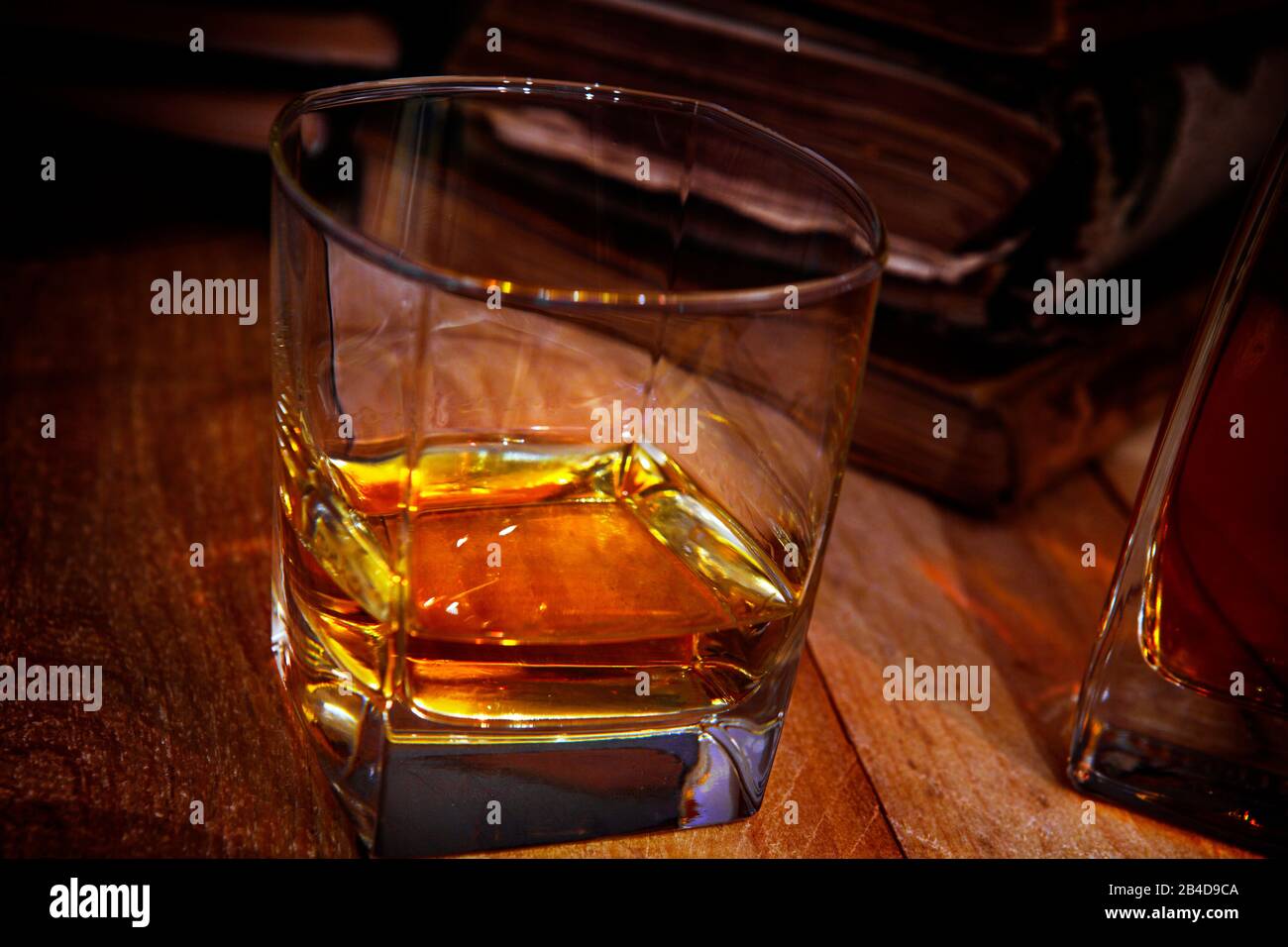 Whiskey glass in the book egg Stock Photo