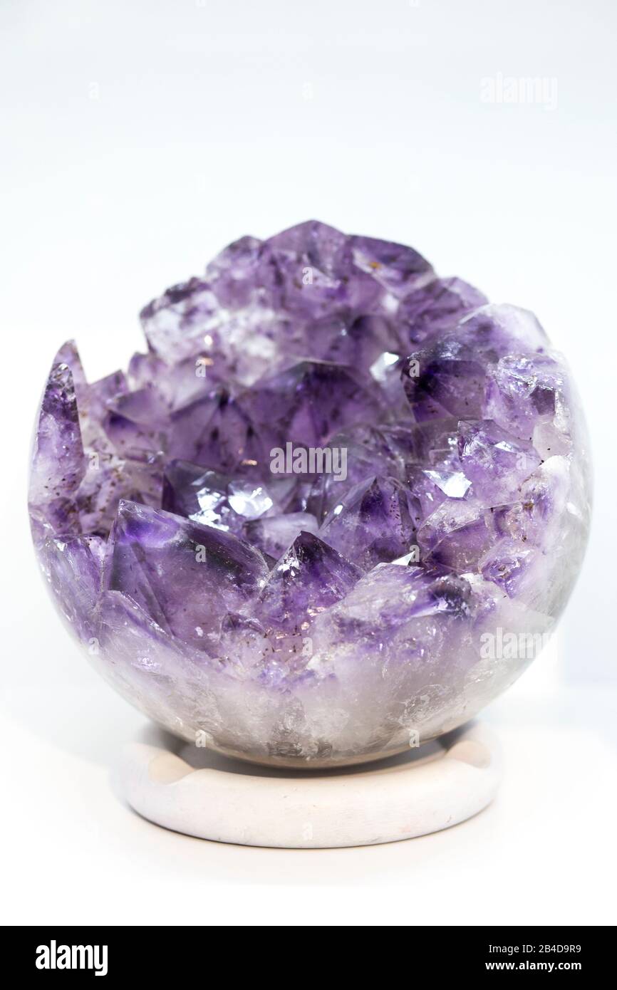 beautiful colorful geode of amethyst on white background Stock Photo