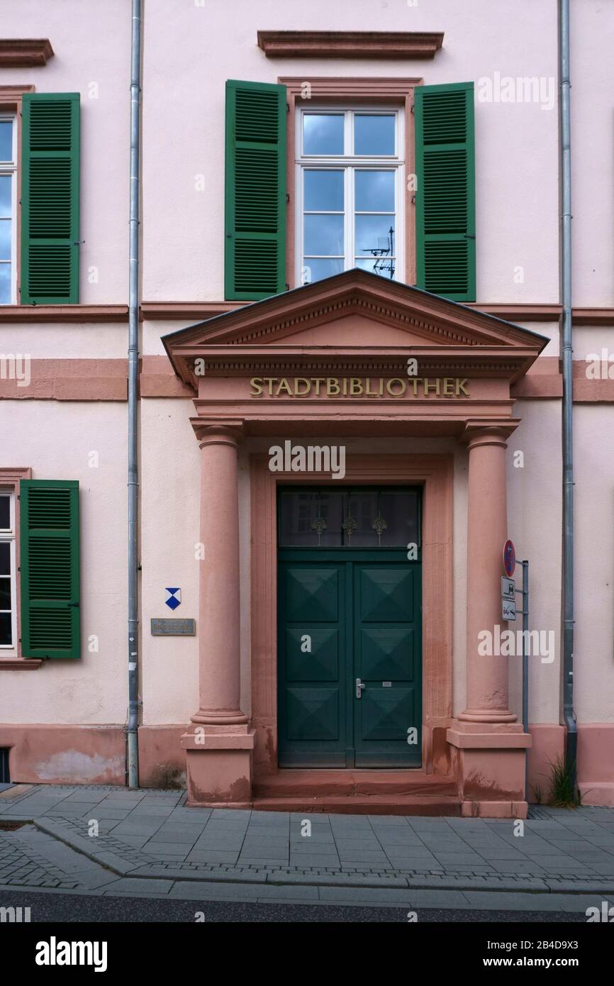 The pillar entrance or portico of the city library in Bad Homburg in a narrow street. Stock Photo