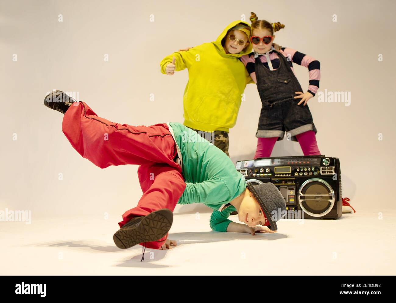 unique kids,cheerful children dressed in hip hop style,dancing kids, break dance kids Stock Photo