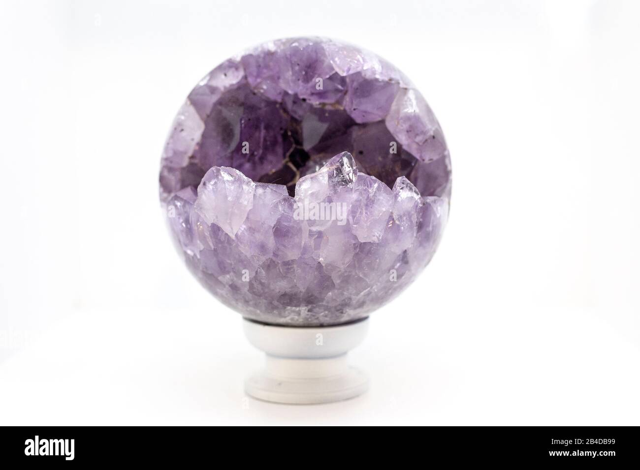 beautiful colorful geode of amethyst on white background Stock Photo