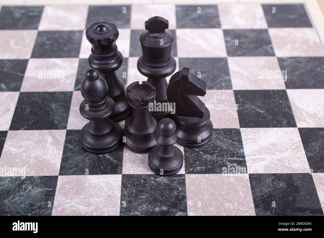 Premium Photo  The golden horse, knight chess piece standing in front of  silver pawn chess pieces on chessboard on dark background. leadership,  follower, team, commander, competition, and business strategy concept.