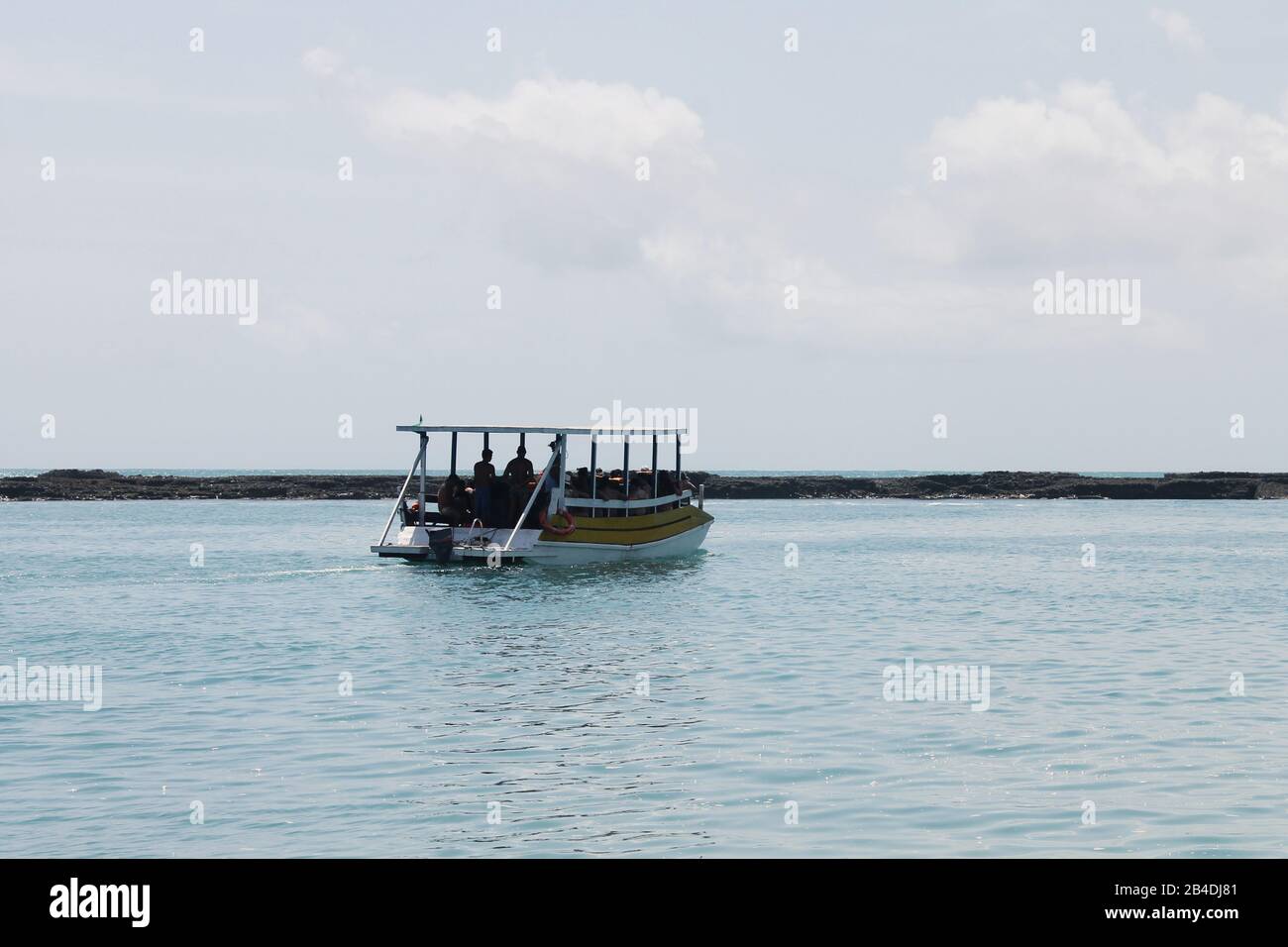 Sailboat in the sea in the evening Maceio, Brazil. Stock Photo