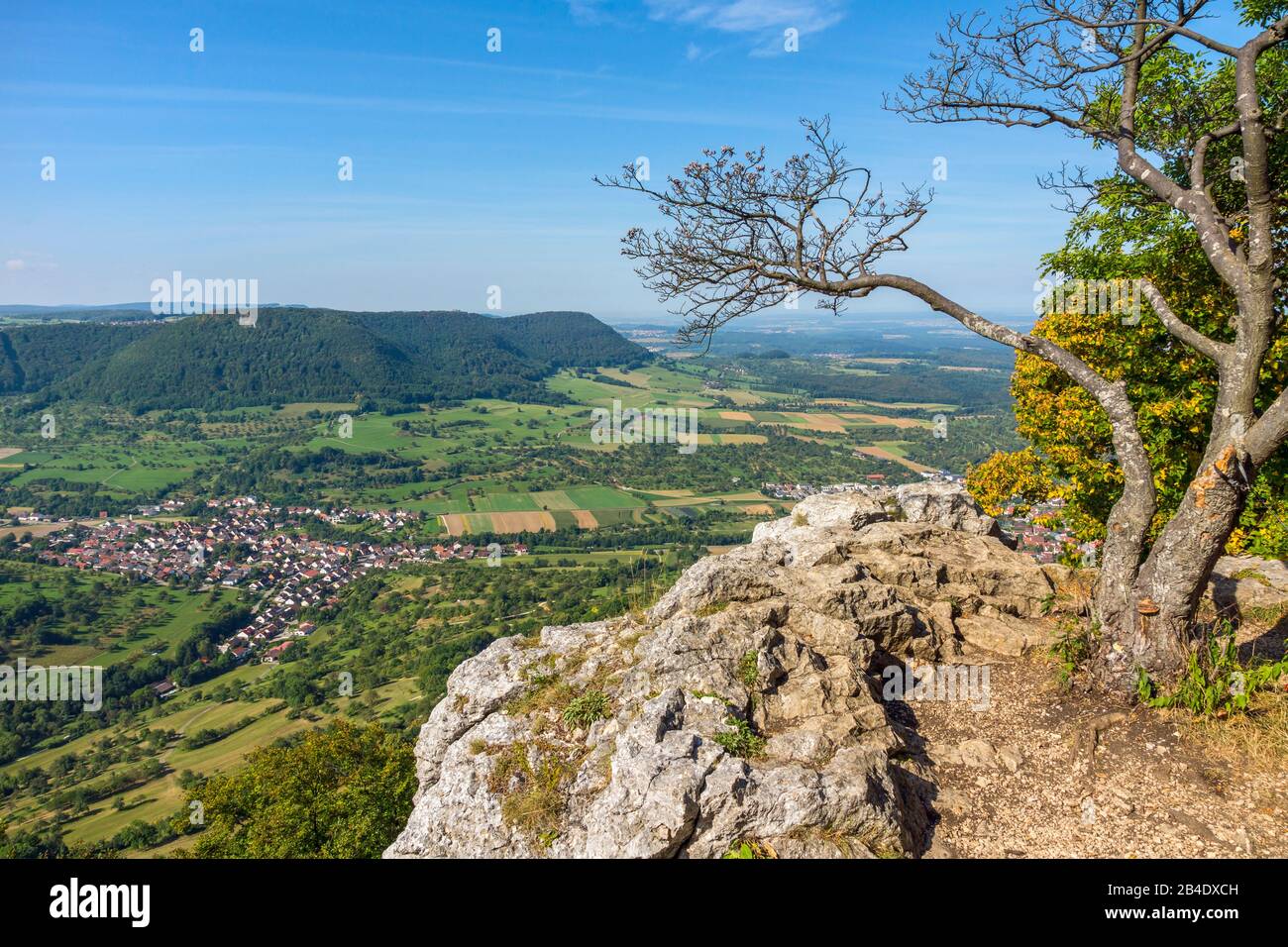 Germany, Baden-Württemberg, Owen, view from the Yellow Rock over Lenningen - Brucken left into the foothills of the Alb. The viewpoint Gelber Fels 771m is located on the Swabian-Alb-Nordrand-Weg HW 1 Stock Photo