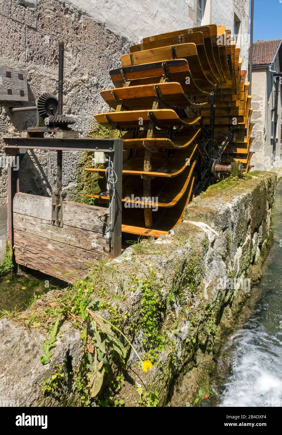 Germany, Baden-Württemberg, Bad Urach, water wheel at the historic monastery mill, city museum. Stock Photo