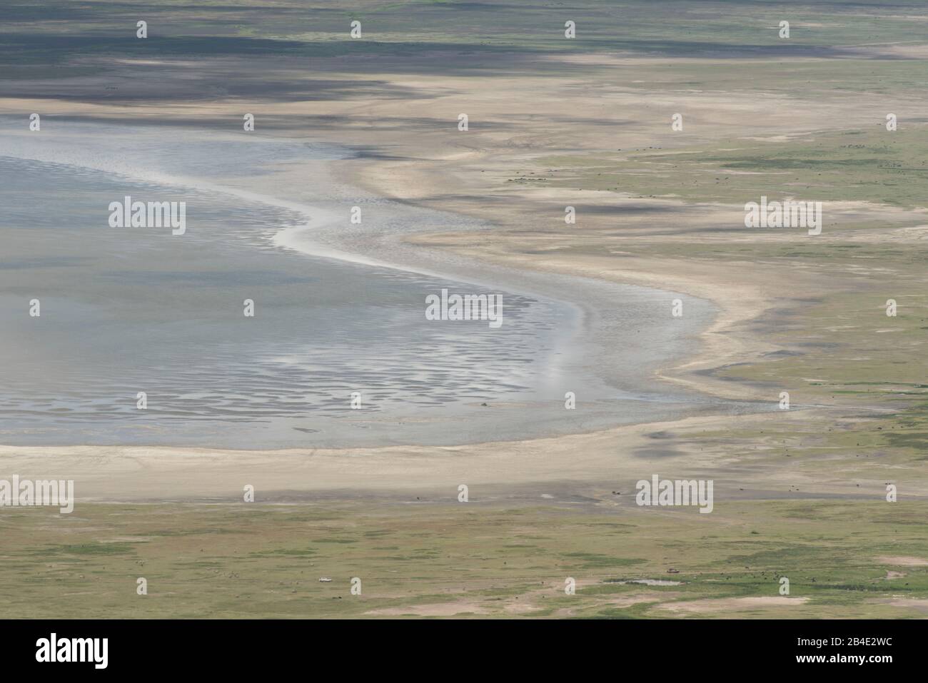 A foot, tent and jeep safari through northern Tanzania at the end of the rainy season in May. National Parks Serengeti, Ngorongoro Crater, Tarangire, Arusha and Lake Manyara. View from the crater rim, Lake Magadi Stock Photo
