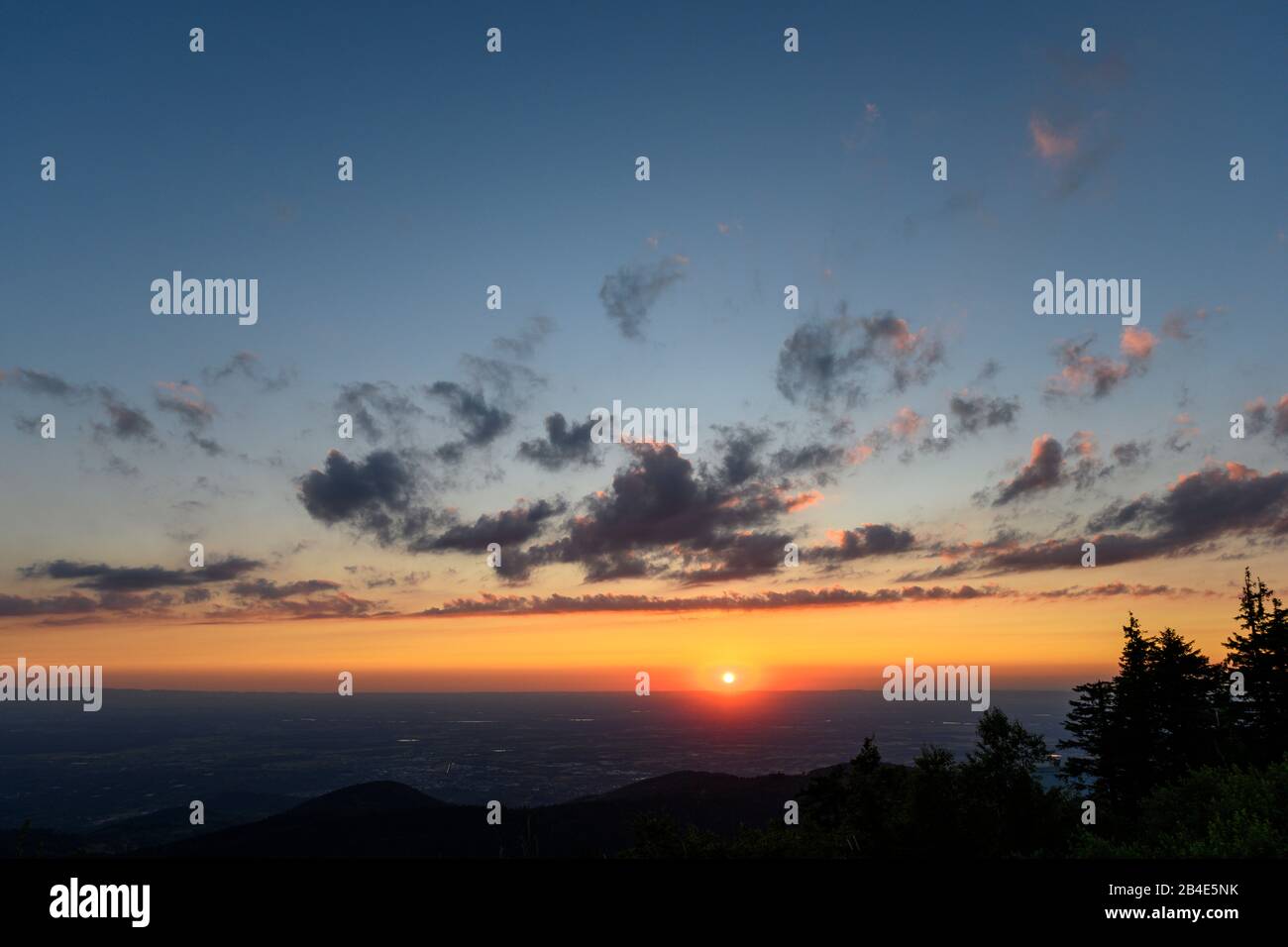 Germany, Baden-Wuerttemberg, Black Forest, sunset, view from the Hornisgrinde, highest mountain in the Northern Black Forest (1163 m), west into the Rhine valley. Stock Photo