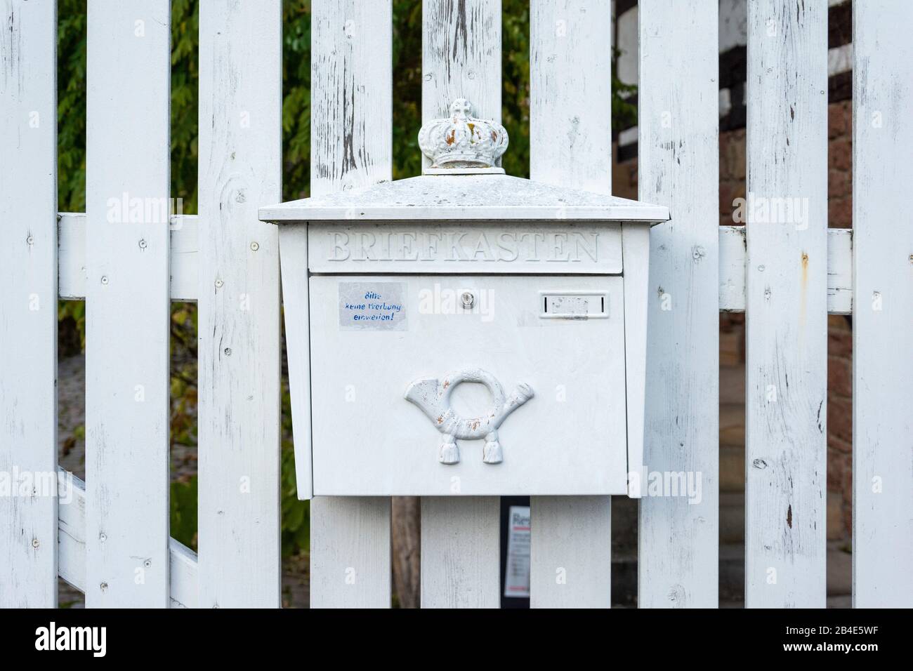 Germany, Rheinlandpfalz, Gleiszellen-Gleishorbach, mailbox at a garden gate. Stock Photo