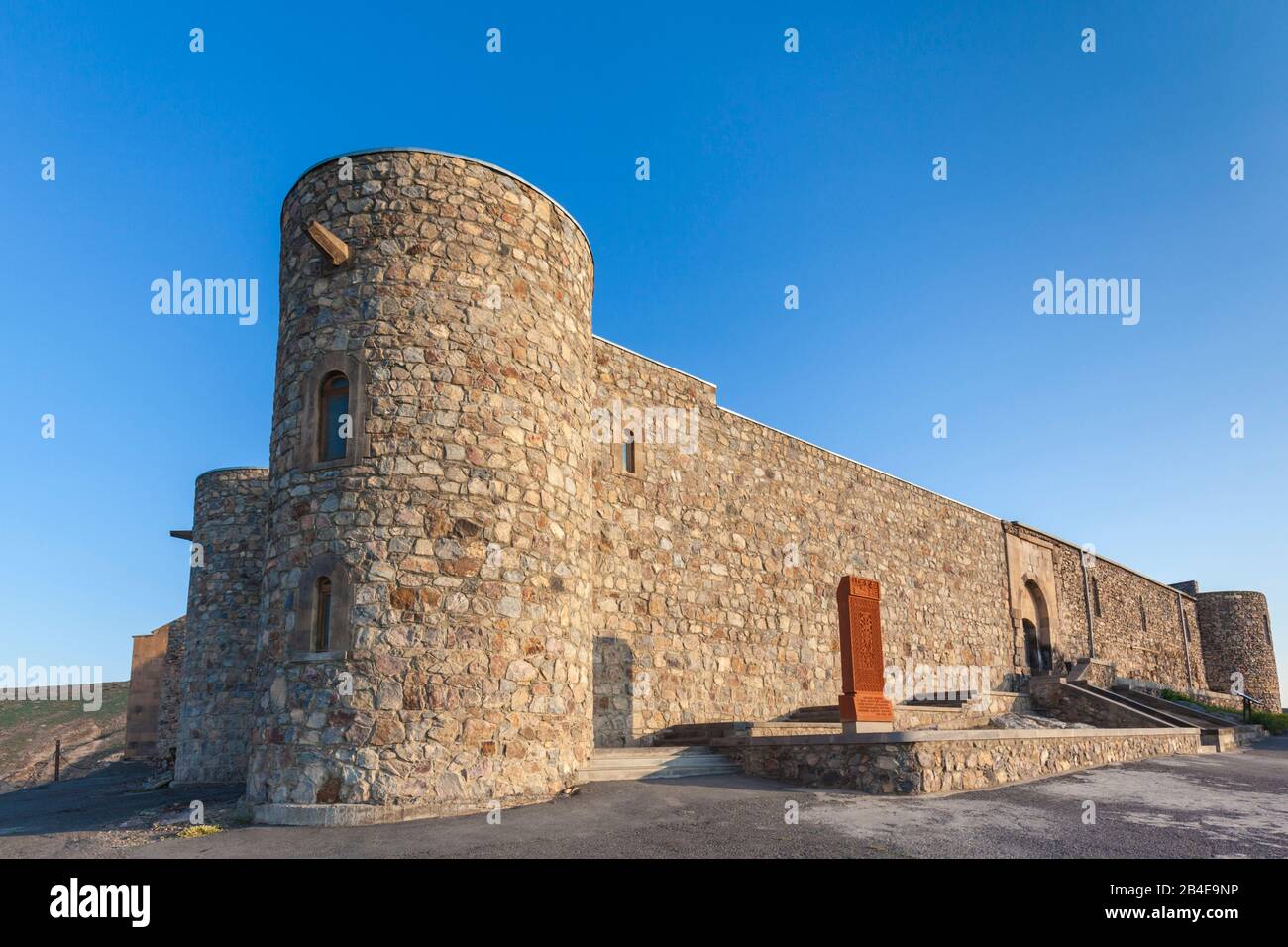 Armenia, Khor Virap, Khor Virap Monastery, 6th century, outer wall with khachkar memorial stone, morning Stock Photo