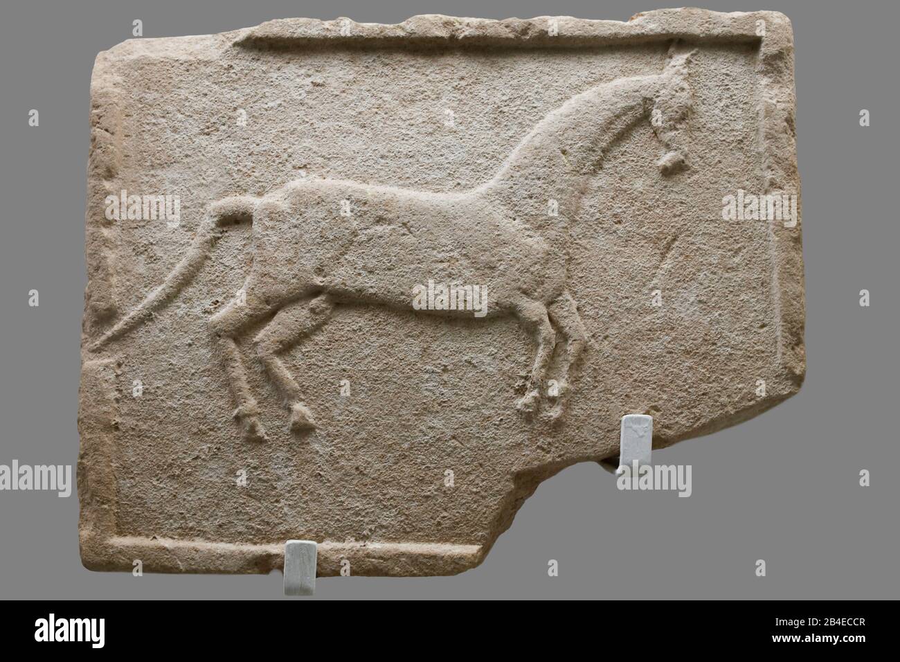 Seville, Spain - July 7th, 2018: Iberian relief belonging to Horses Sanctuary. Archaeological Museum of Seville, Andalusia, Spain Stock Photo
