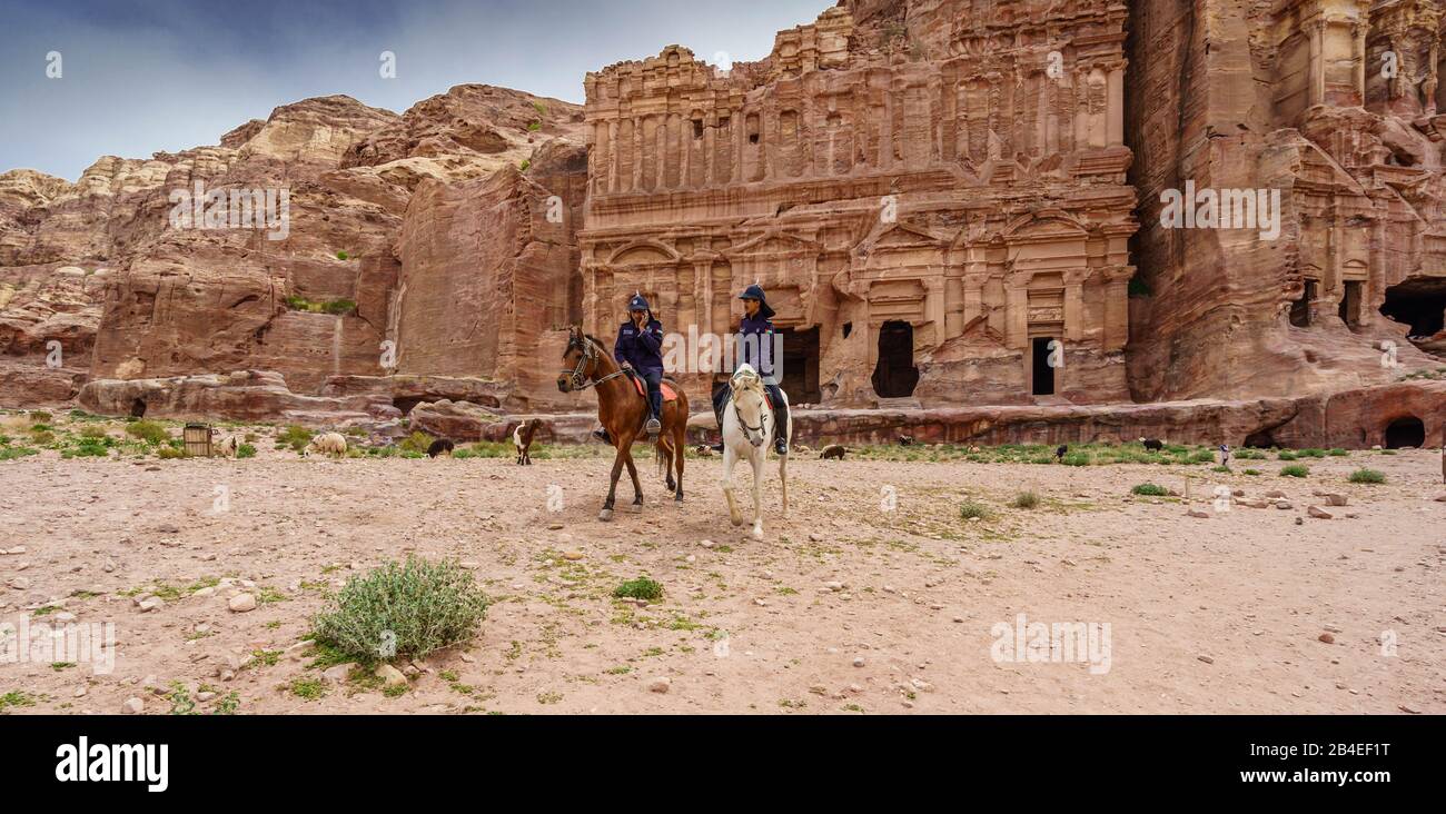 Two Mounted Police Patrol Petra, Jordan Stock Photo