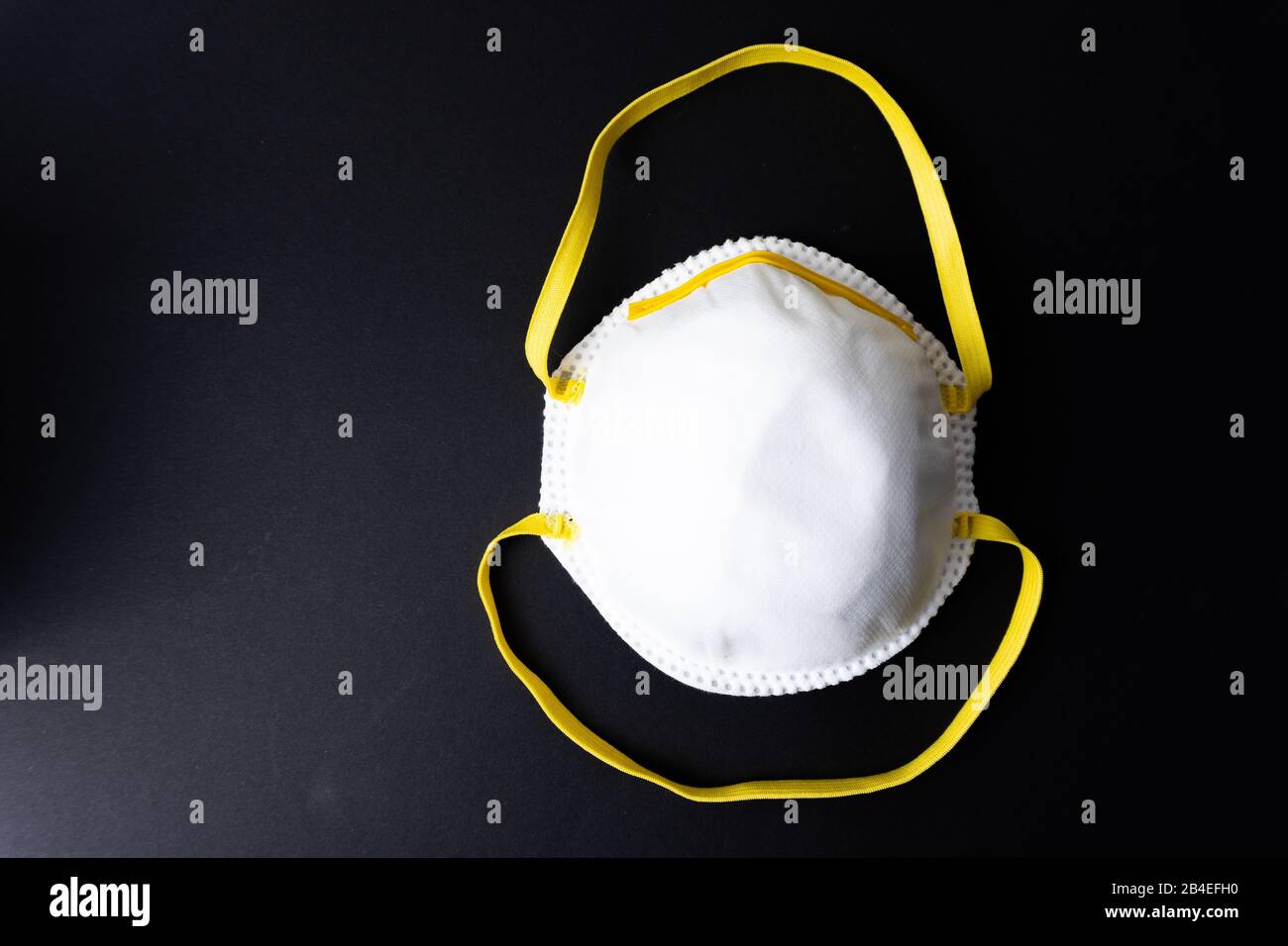 Face mask on black background hi-res stock photography and images - Alamy