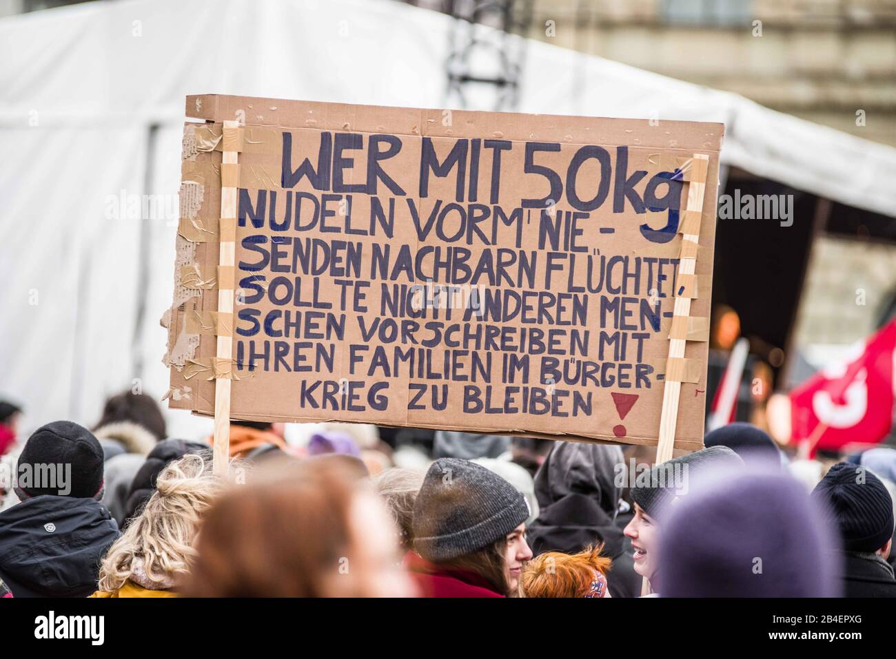 Munich, Bavaria, Germany. 6th Mar, 2020. A sign criticizing Germany for ''Hamster Shopping'' as a response to the Coronavirus, leaving pasta and toilet paper shelves throughout the country empty. As a response to the politics of hate and the terror attack in Hanau many attribute to the Alternative for Germany (AfD) party and the CSU of Bavaria, the Bellevue di Monaco and the Bayerisches Fluechtlingsrat (Bavarian Refugee Center) organized the "Just Don't Do It"" demonstration at Max Joseph Platz to oppose hate and right-wing terrorism in Germany. Counting the latest developments, Germany Stock Photo