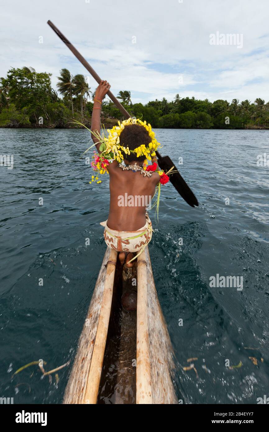 Kofure Girl in Outrigger Canoe, Tufi, Oro Province, Papua New Guinea Stock Photo