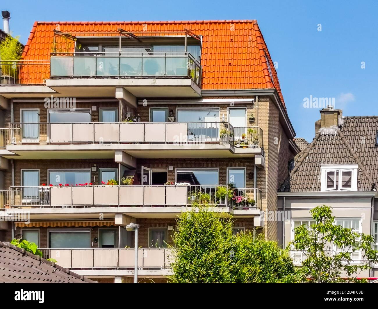 Apartments building with balconies in Breda, city architecture of the