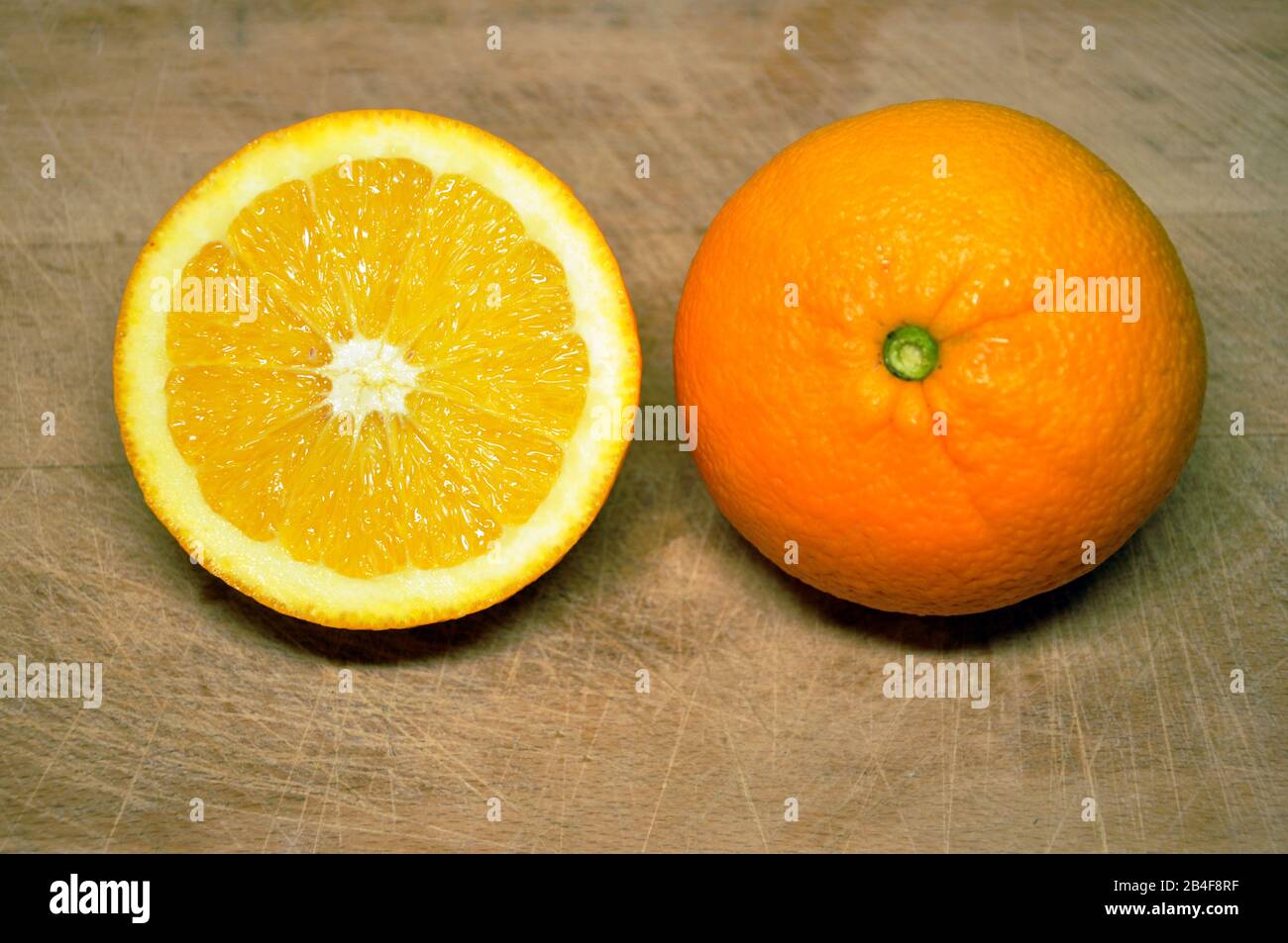 oranges on wood background Stock Photo