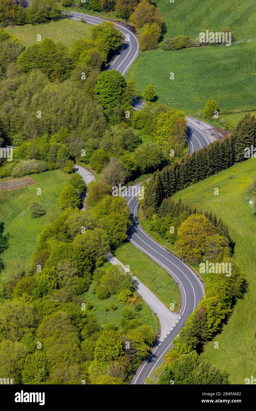 Aerial view of the curves Prioreier Strasse in Breckerfeld, Ruhrgebiet, northern Sauerland in the state of North Rhine-Westphalia, Germany. Stock Photo