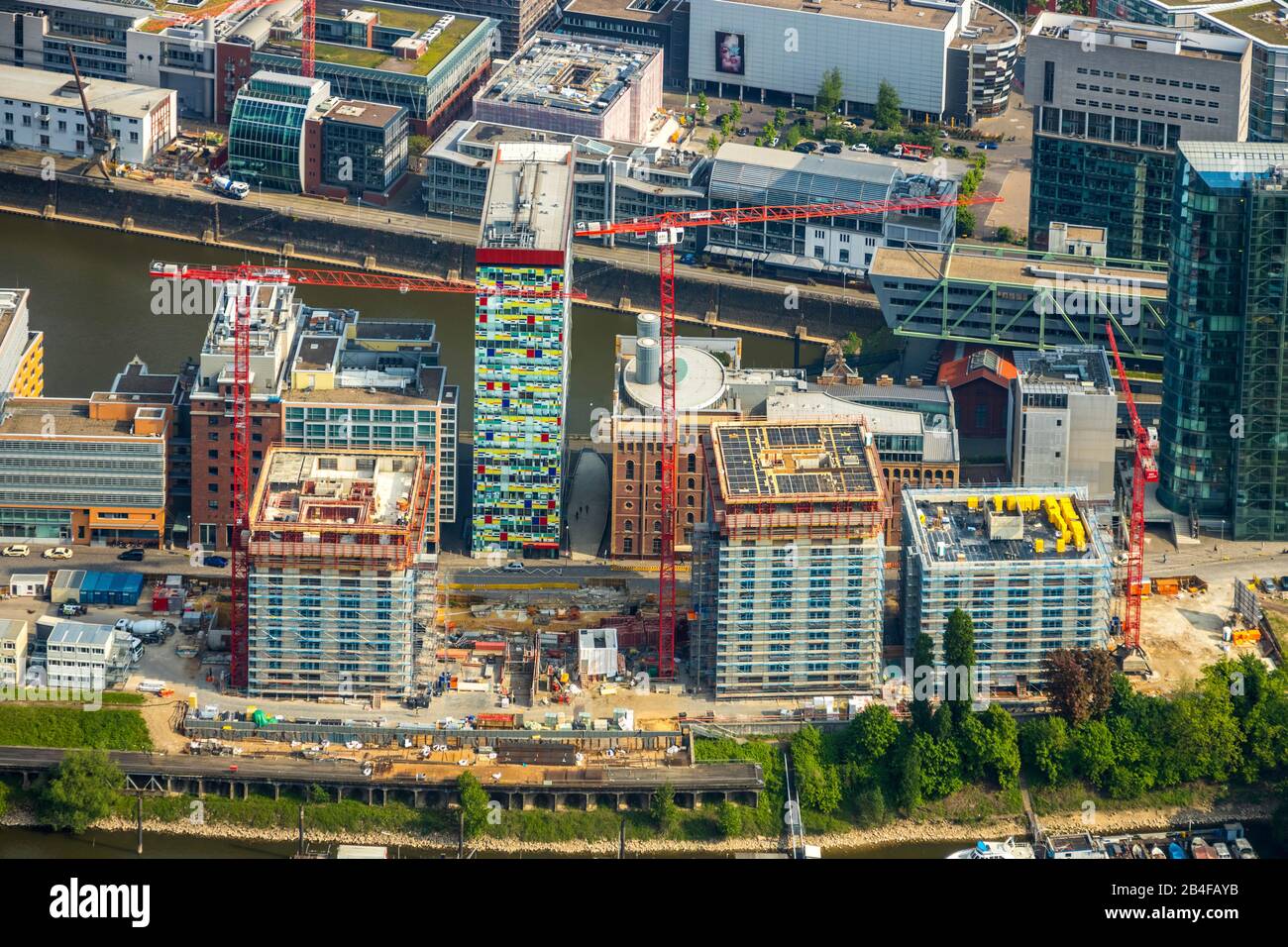 Aerial view of the construction site in Speditionstrasse in Düsseldorf's Medienhafen. Here, the commercial port and harbor basin A is the home port project with 400 apartments in Dusseldorf in the urban district district III in the Rhineland in the state of North Rhine-Westphalia, Germany Stock Photo
