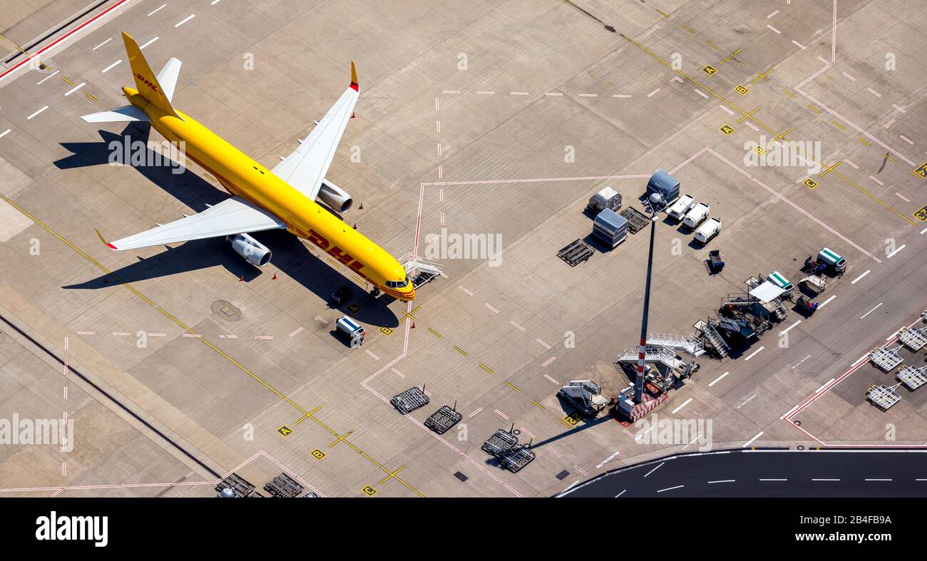 Aerial view of Cologne / Bonn 'Konrad Adenauer' airport with DHL cargo plane on the apron, international airport in the southeastern city area in Cologne-Grengel and to a small extent on Troisdorf area in Cologne in the Rhineland in the state of North Rhine-Westphalia, Germany, Stock Photo