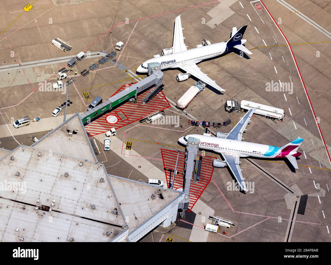 Aerial view of Cologne / Bonn 'Konrad Adenauer' airport with check-in fingers, jetties with jets, commercial aircraft, international airport in the south-eastern city of Cologne-Grengel and to a small extent on the Troisdorf area in Cologne in the Rhineland in the state of North Rhine-Westphalia, Germany Stock Photo
