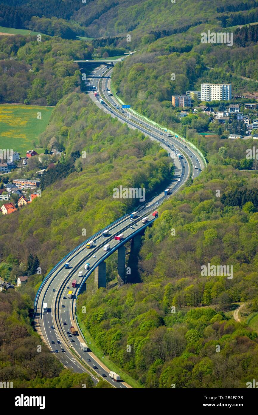 Aerial view of the freeway of the A45 motorway Sauerlandlinie with curves and bridges in the area Lüdenscheid-Nord with forest areas in Lüdenscheid in Sauerland in the state of North Rhine-Westphalia, Germany. Stock Photo