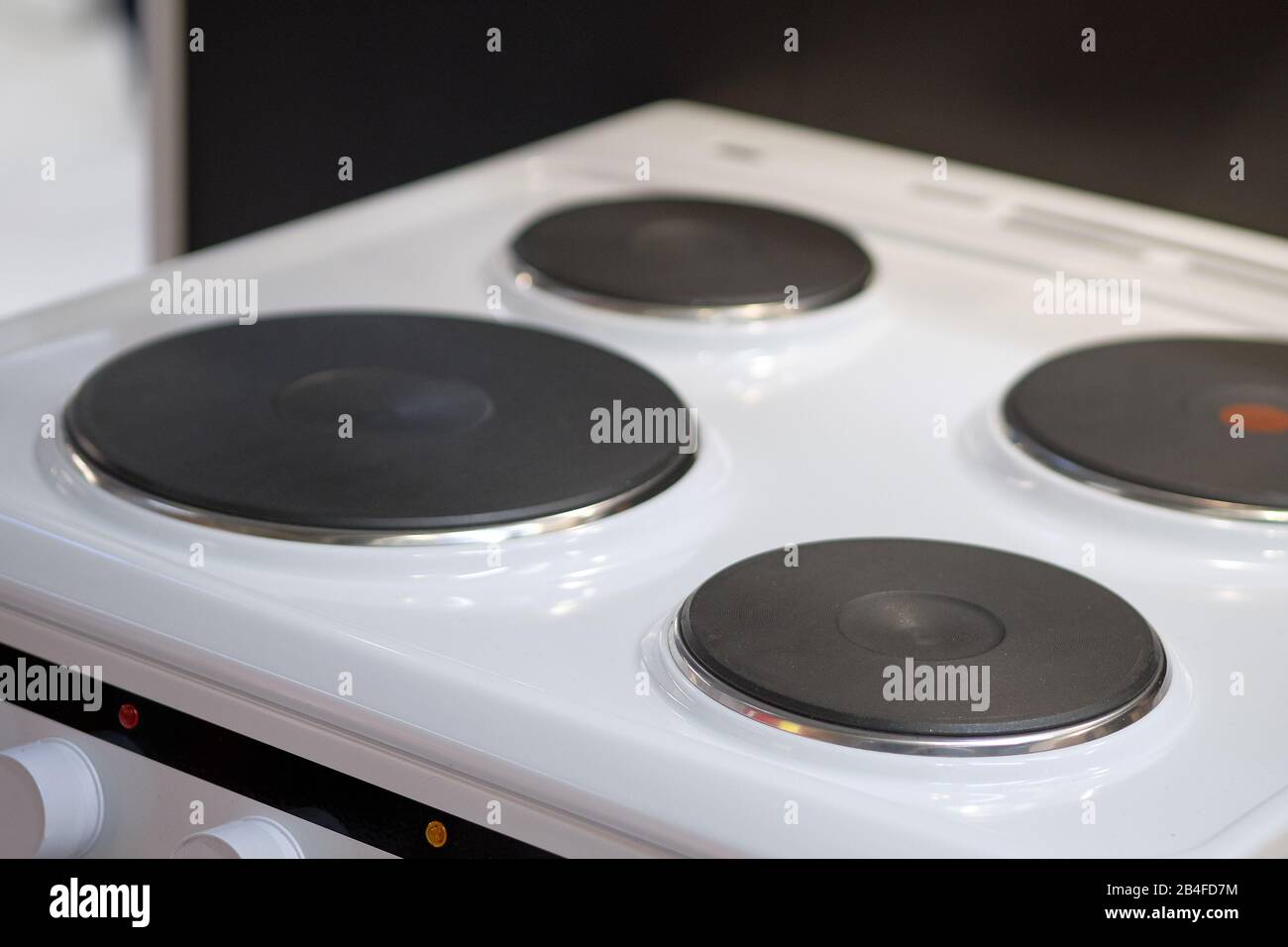 Kitchenware modern electric white stove. Close up Stock Photo - Alamy