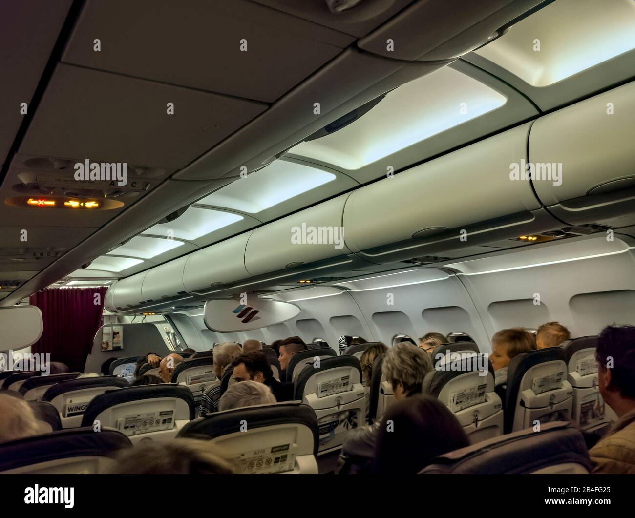 Airplane, inside, passengers Stock Photo