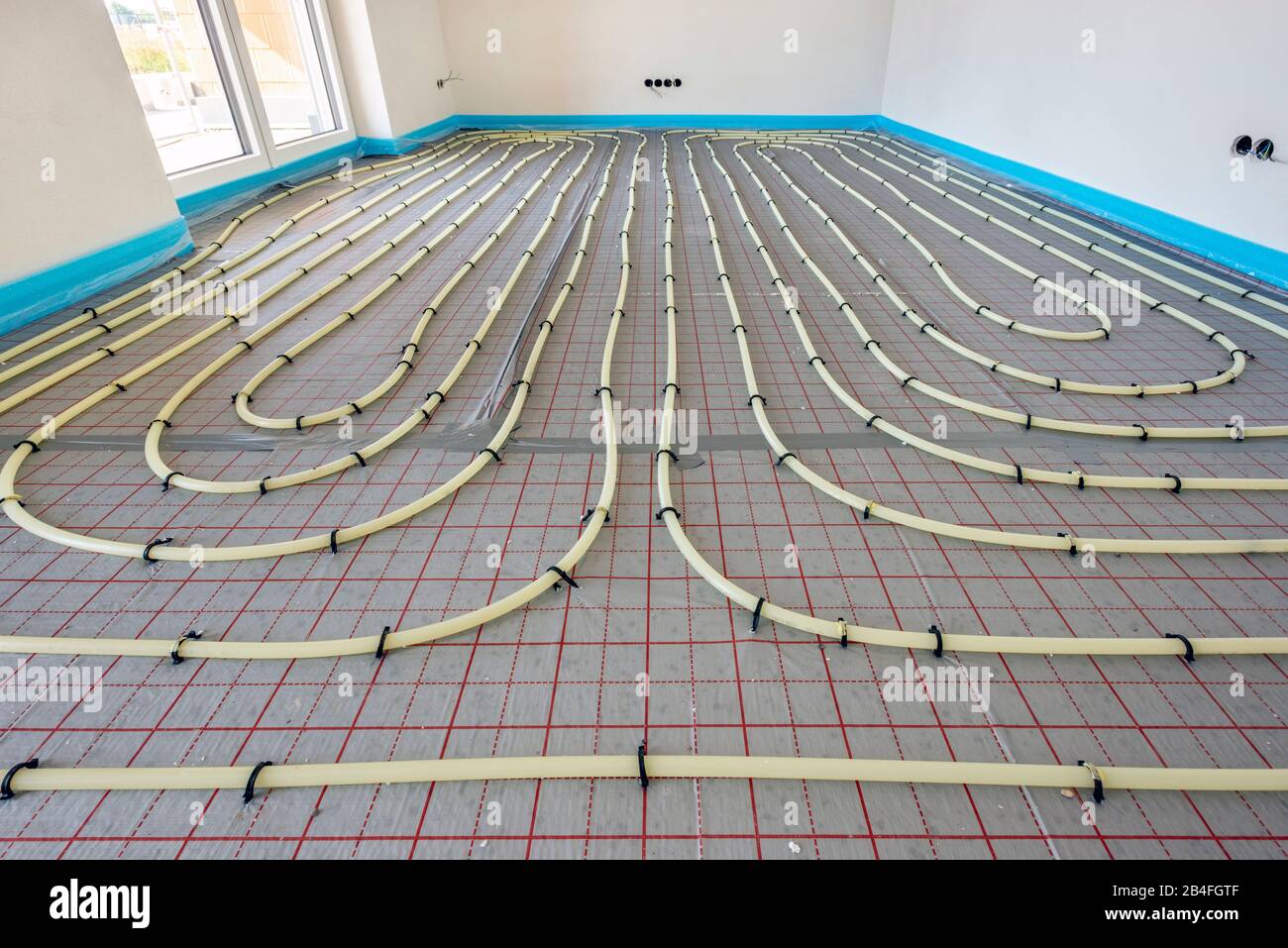 Fußbodenheizung mit Heizschlangen in einem Neubau Stock Photo