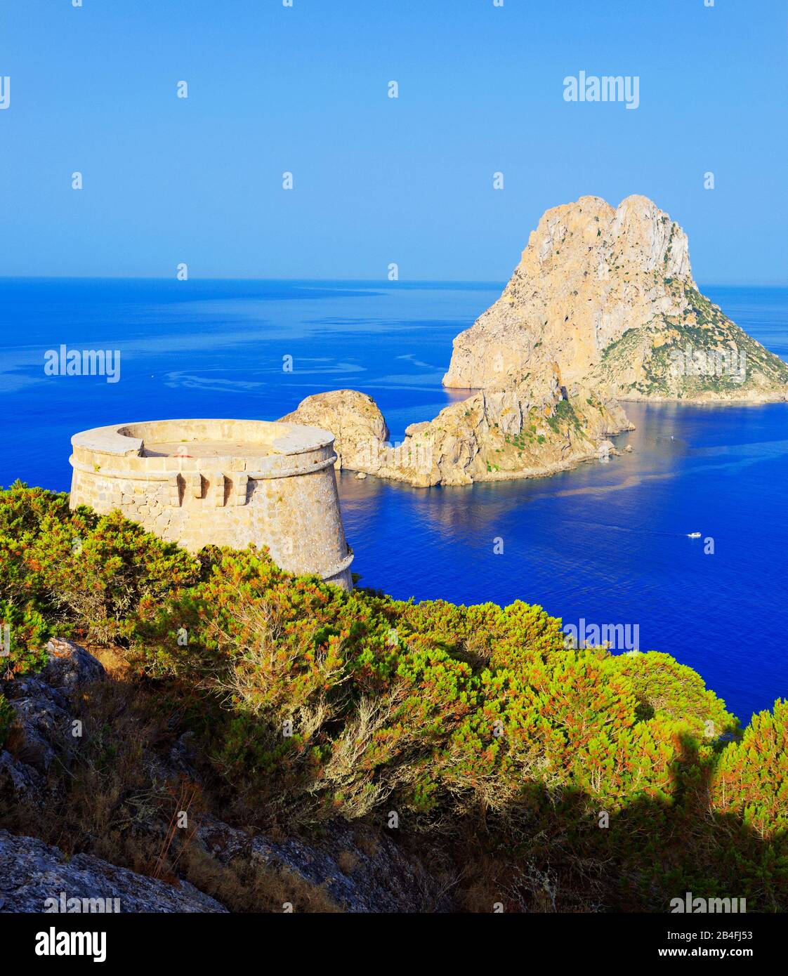 Torre des Savinar and Es Vedra Islets in background, Ibiza, Balearic Islands, Spain, Stock Photo