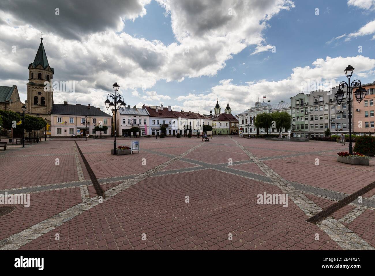 Europe, Poland, Podkarpackie Voivodeship, Sanok / Royal Free City of Sanok - Main Market Square in Sanok and Neogothic town hall Stock Photo