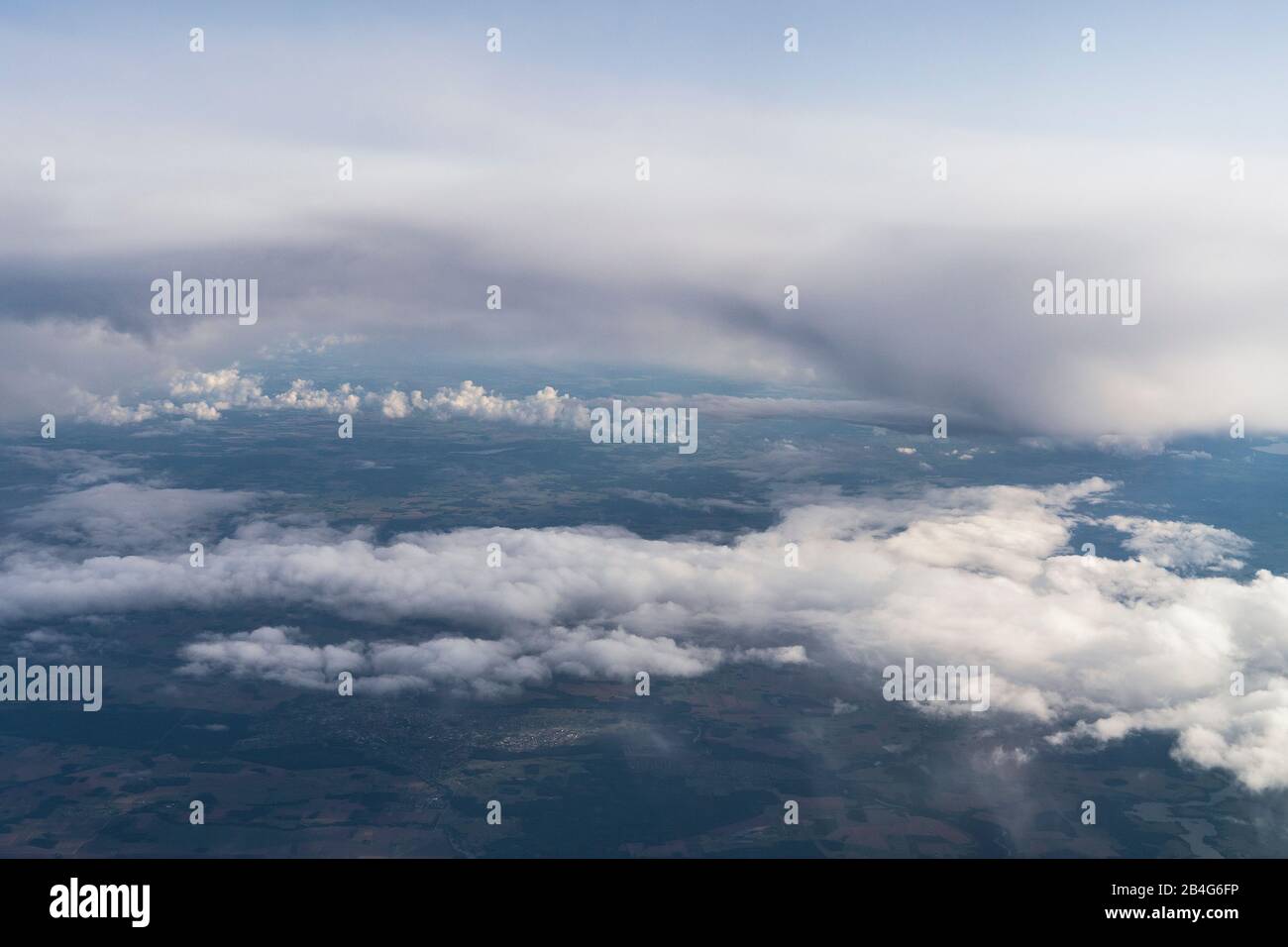 Flight, aerial view, Cumulus incus and Cumulonimbus calvus, thunderclouds Stock Photo