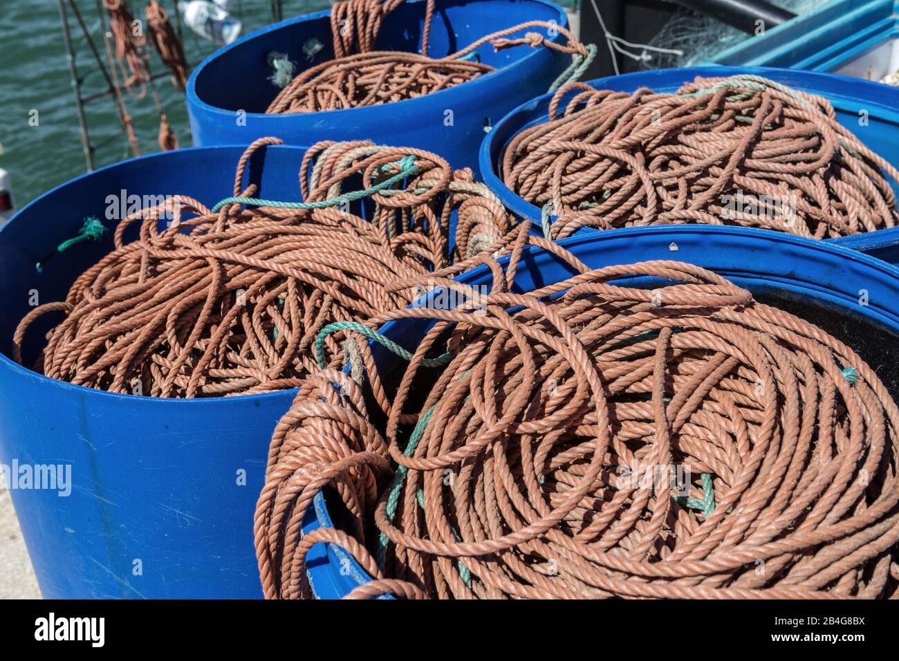 barrel fishing nets Barrel, rope and fishing net Stock Photo