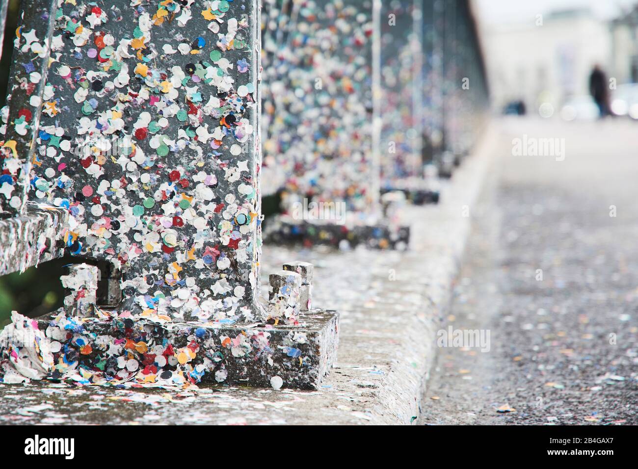 Europe, Switzerland, Basel, traditional event, Basel Fasnacht, the largest in Switzerland, intangible cultural heritage of mankind, Wettstein bridge after the Cortège, confetti stuck on pillars and roadway Stock Photo