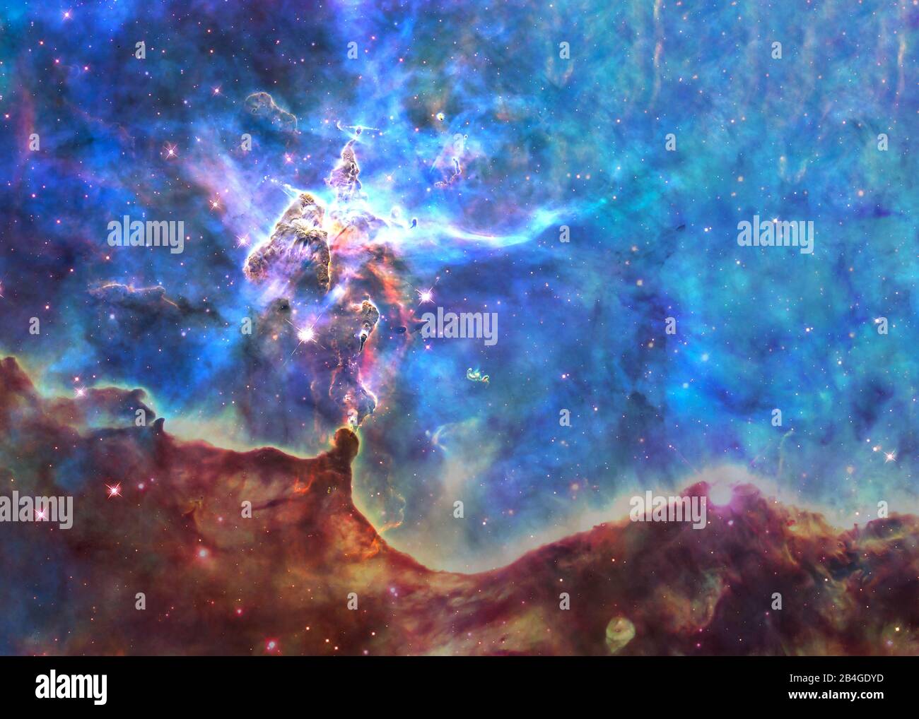 Somewhere in deep space. Carina Nebula and Mystic Mountain complex. Science fiction wallpaper. Elements of this image were furnished by NASA. Stock Photo
