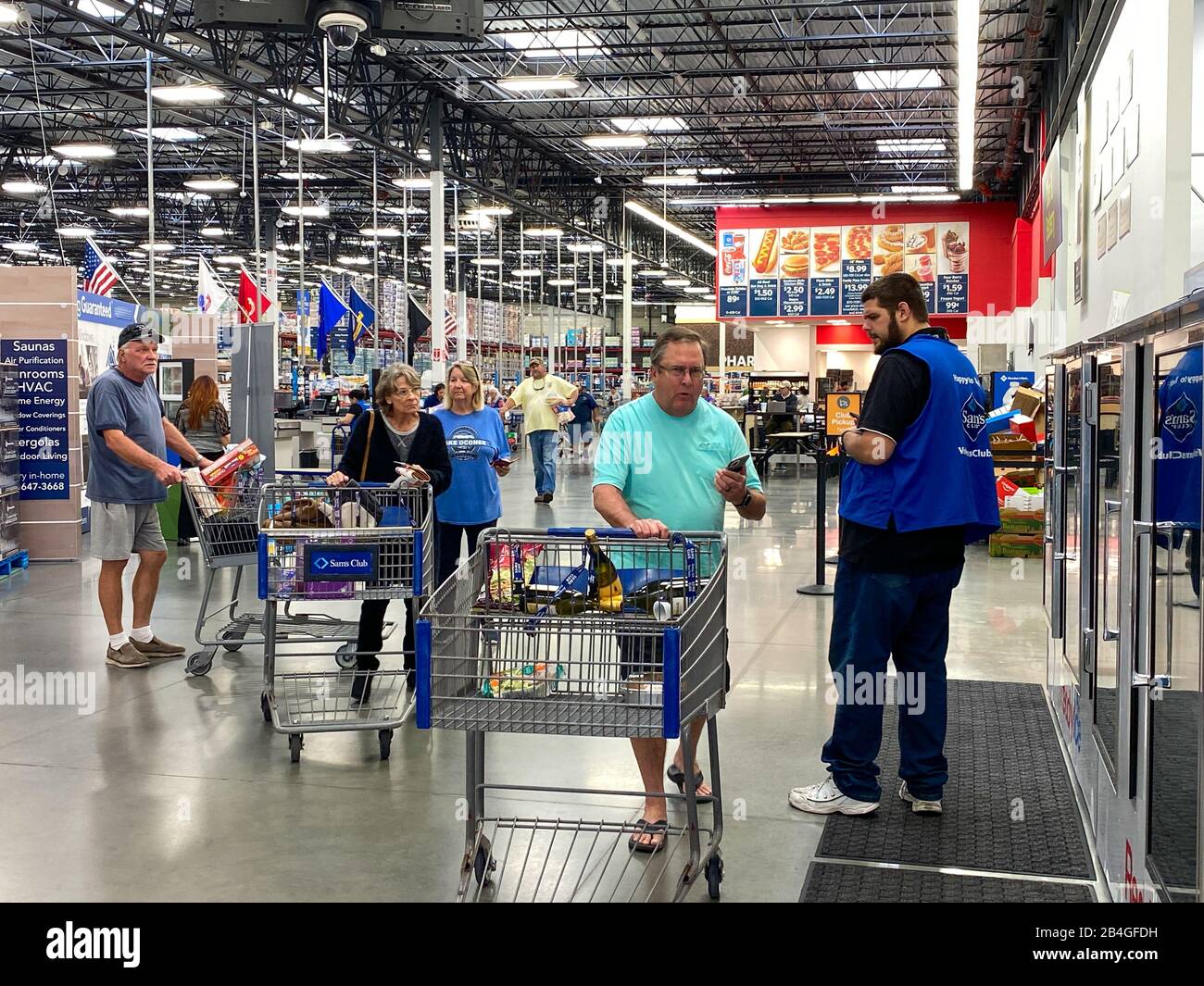 Orlando,FL/USA1/23/20 A Sams Club employee checking customers items