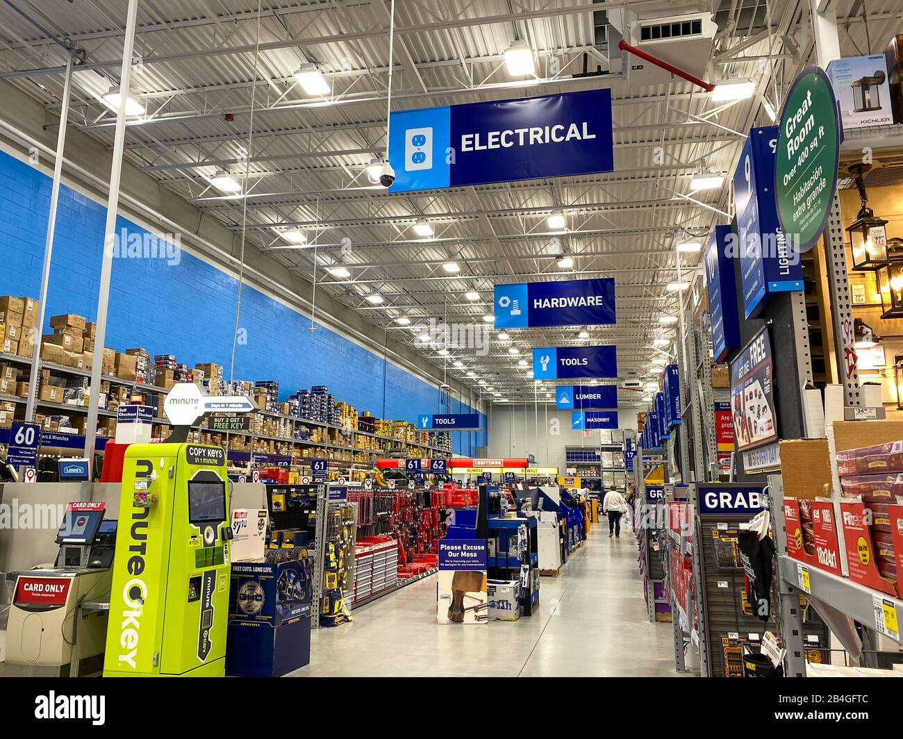 Orlando,FL/USA-1/20/20: The signs hanging from the ceiling at Lowes home improvement store that designate what departments are in the aisle while peop Stock Photo