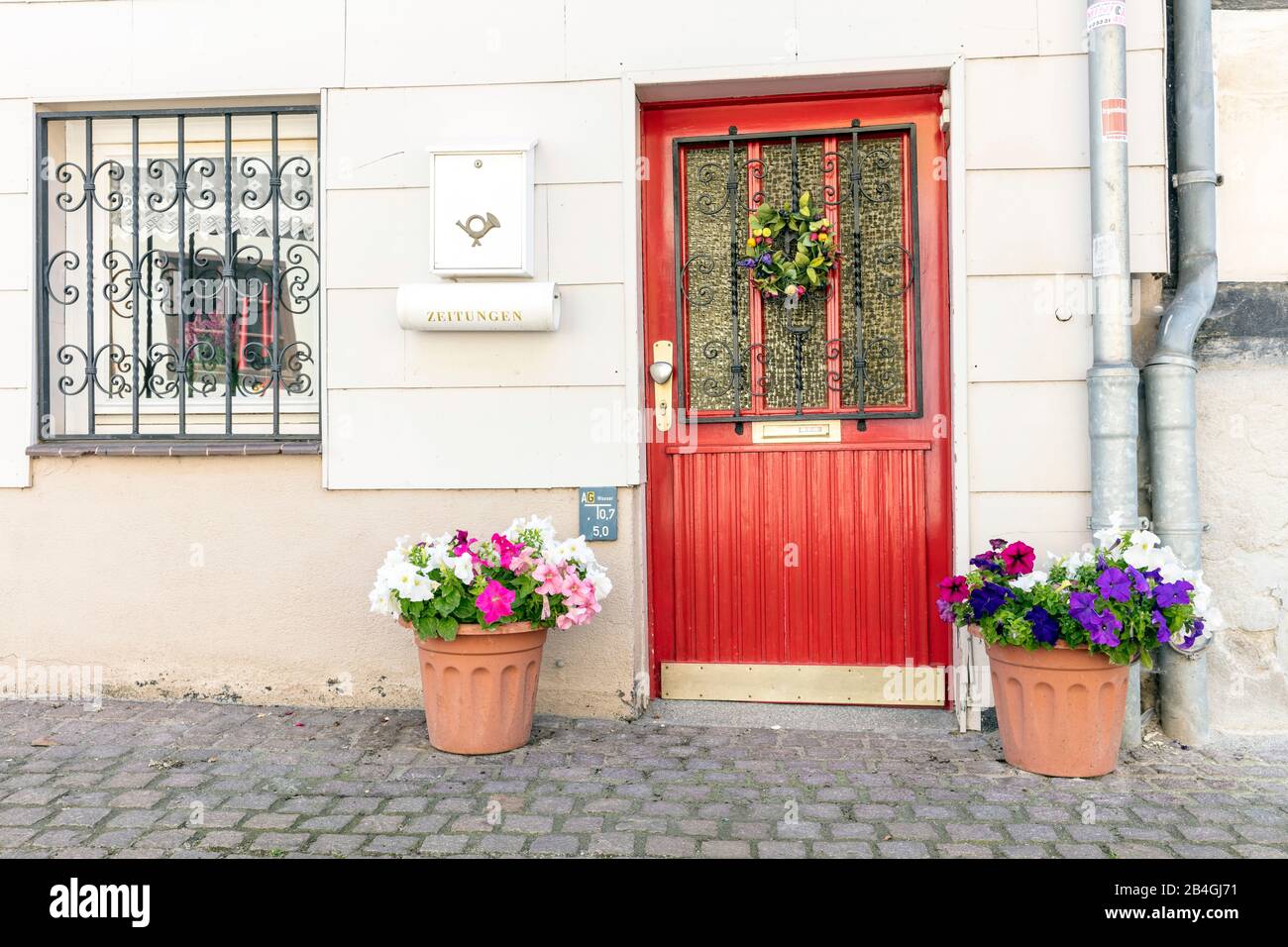 House facade, front door, windows, flower decoration, Wolfenbüttel, Lower  Saxony, Germany, Europe Stock Photo - Alamy