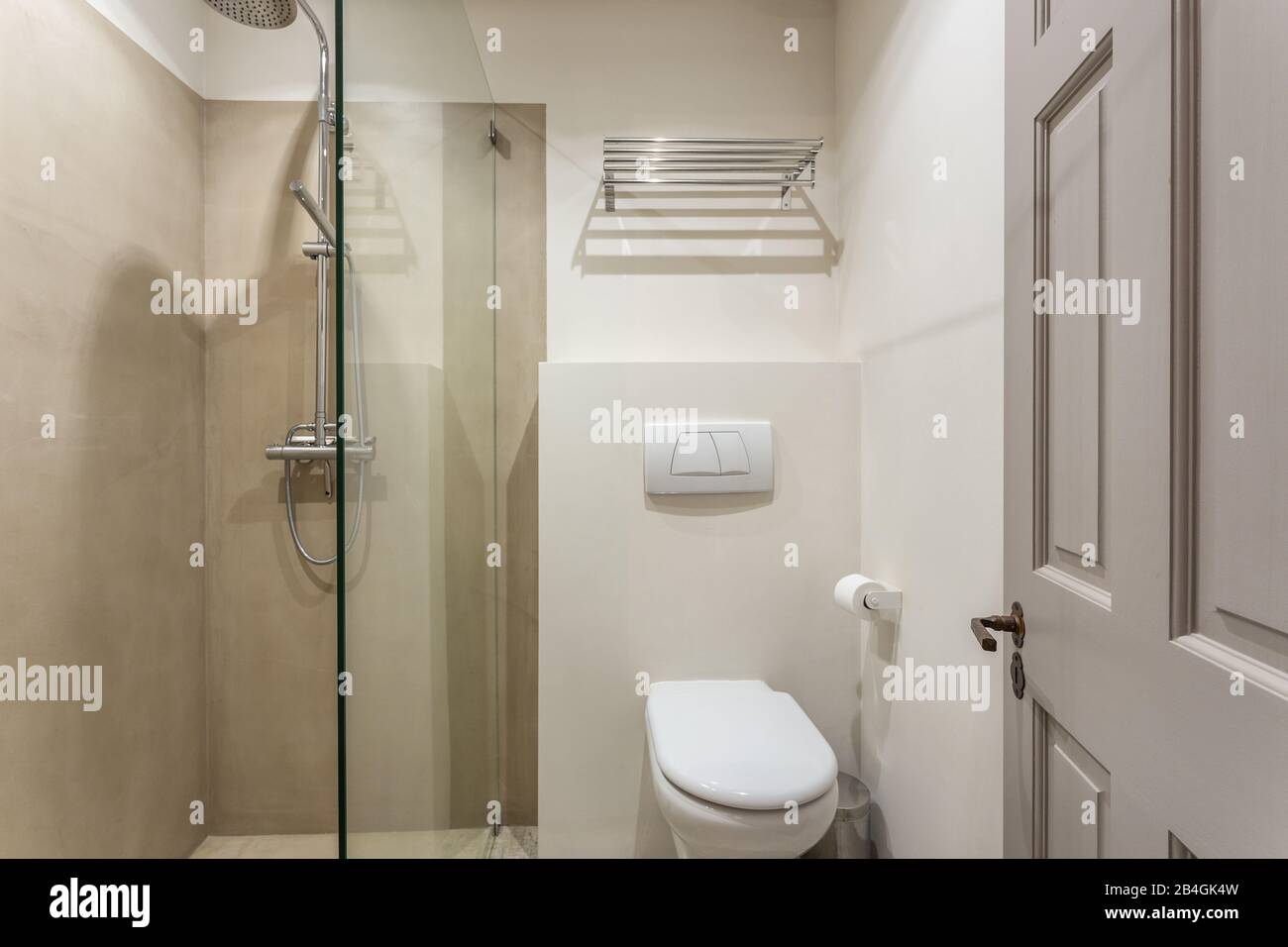 Modern bathroom shower room with toilet and amenities Stock Photo Alamy