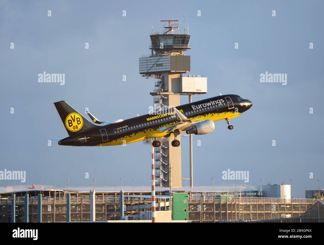 DŸsseldorf International Airport, DUS, aircraft at take-off, Eurowings Airbus A320-214, Borussia Dortmund, BVB 09 branding, Stock Photo