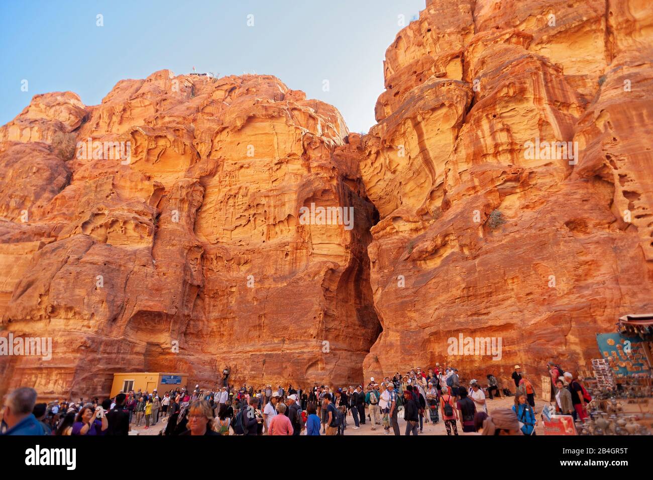 Jordan, valley cut in the rock city Petra, tourists Stock Photo