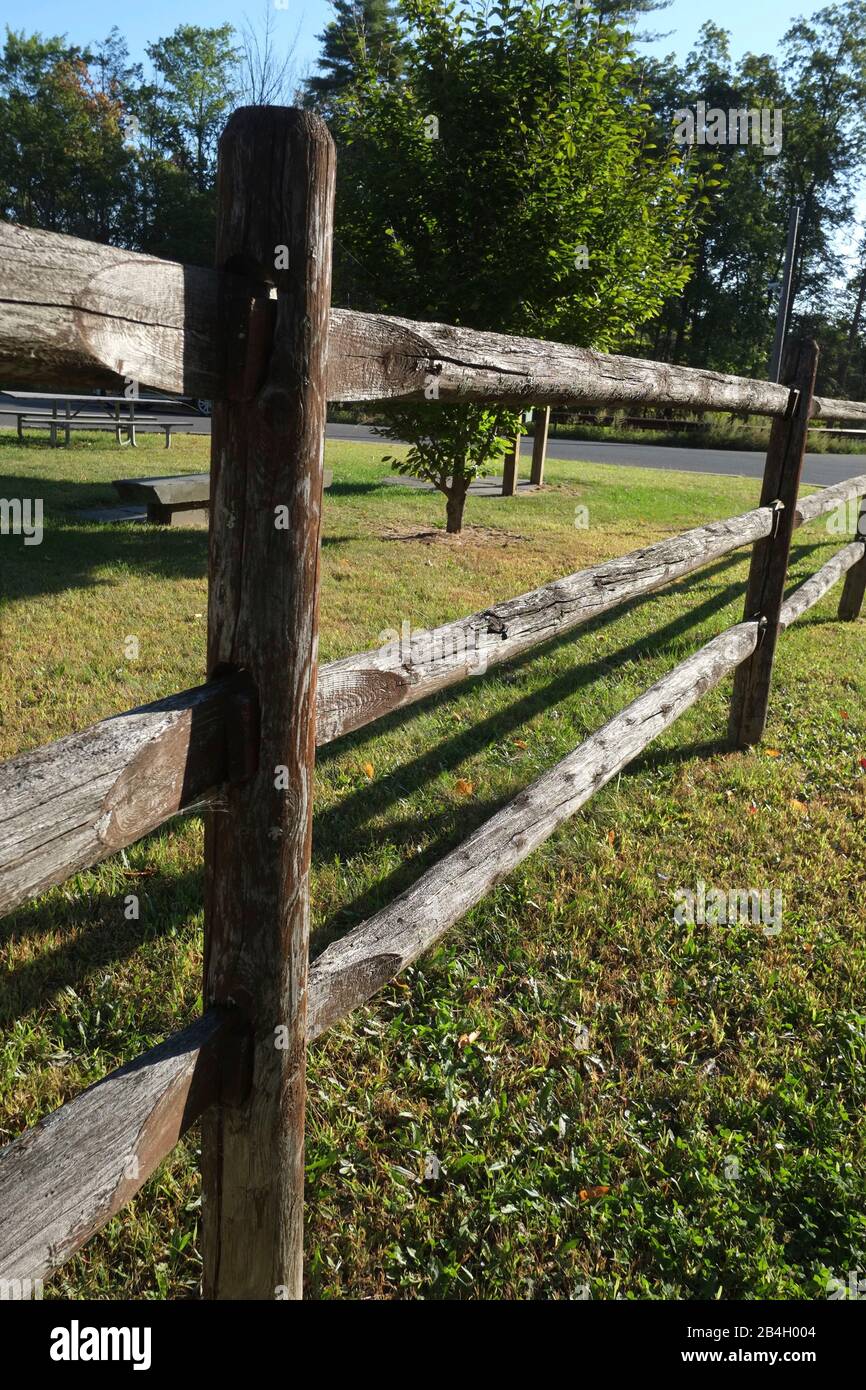 Wooden fence to keep horses from reaching the road. Ashokan, NY Stock Photo